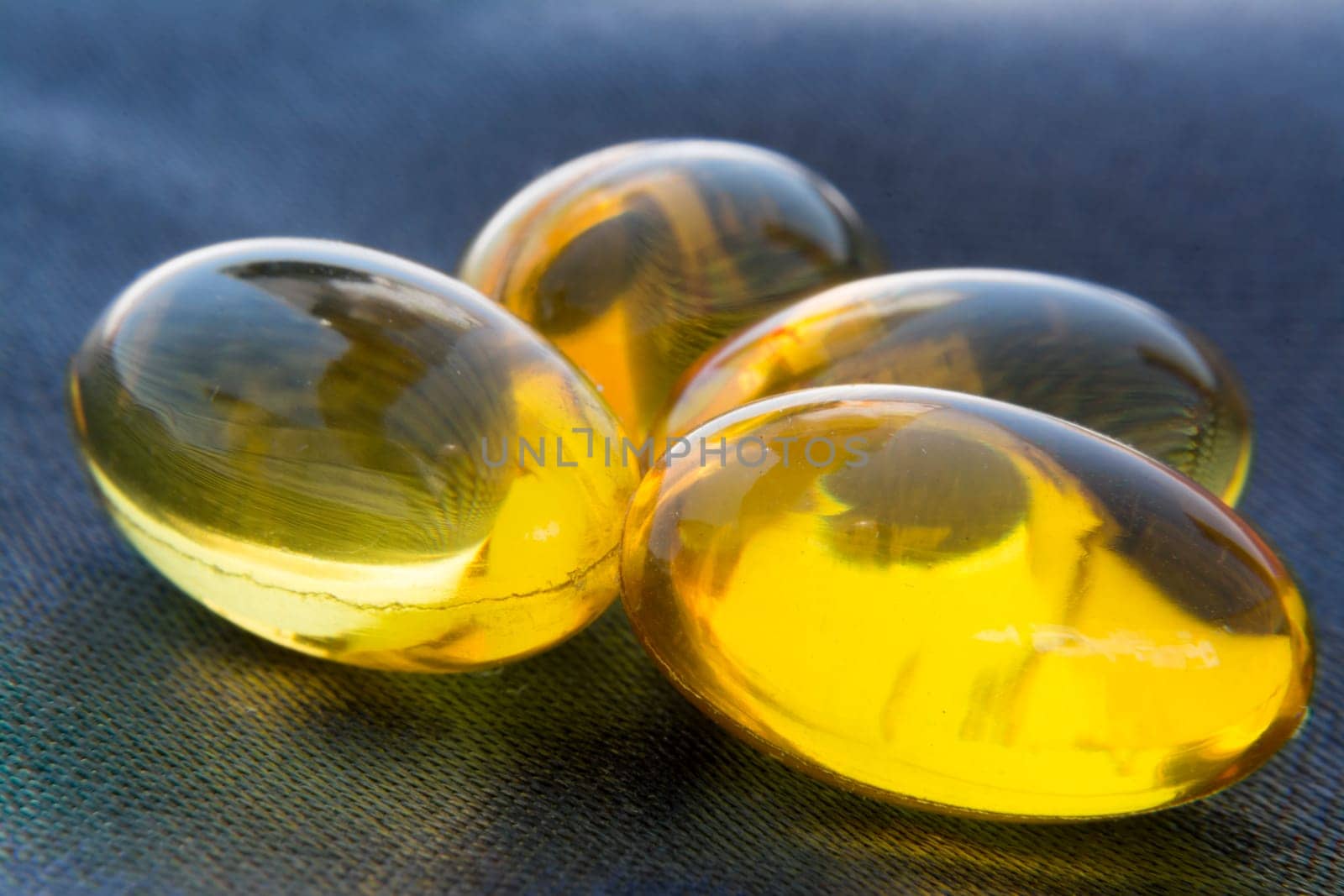 Macro To A Yellow Pills With Blue Background