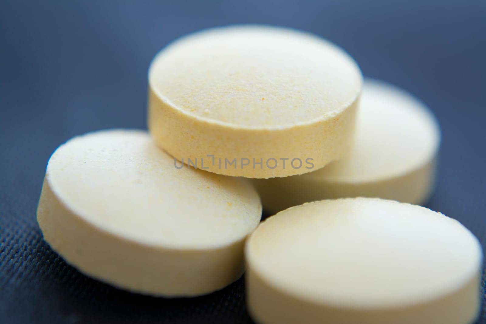Macro to a round yellow pills