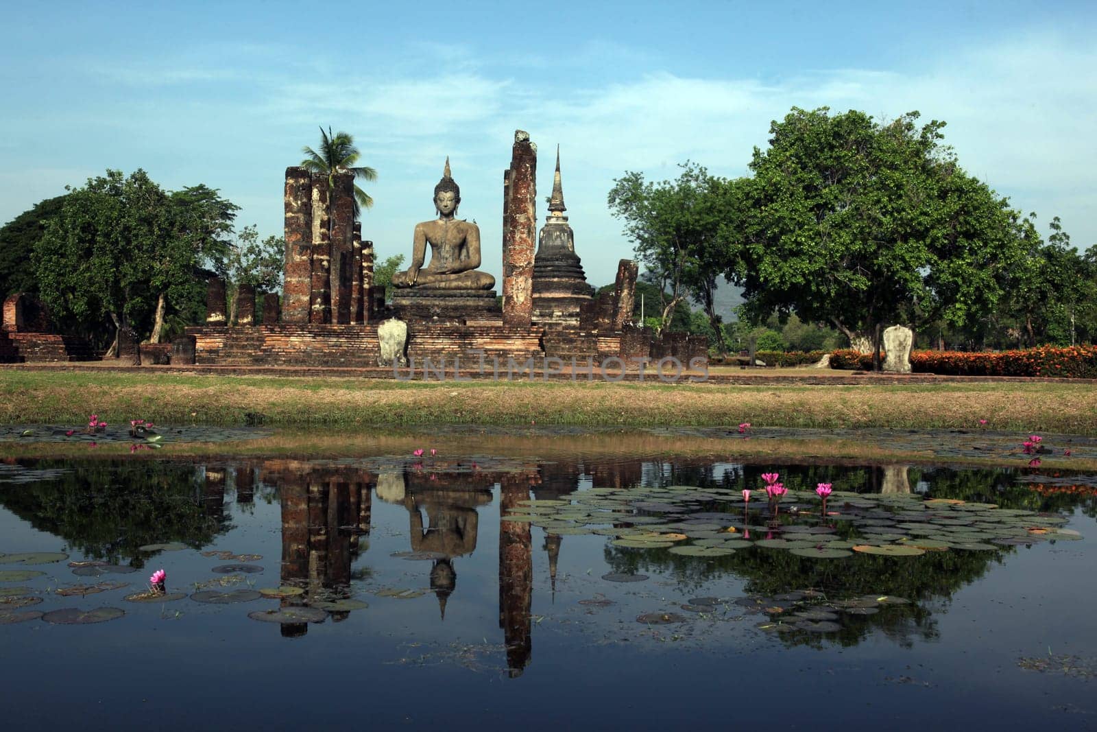 The Wat Mahathat Temple in the temple complex of Alt-Sukhothai in the province of Sukhothai in the north of Thailand in South East Asia.