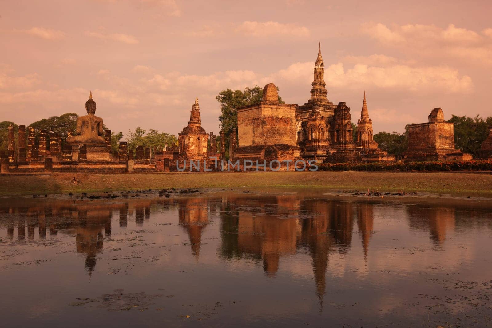 The Wat Mahathat Temple in the temple complex of Alt-Sukhothai in the province of Sukhothai in the north of Thailand in South East Asia.