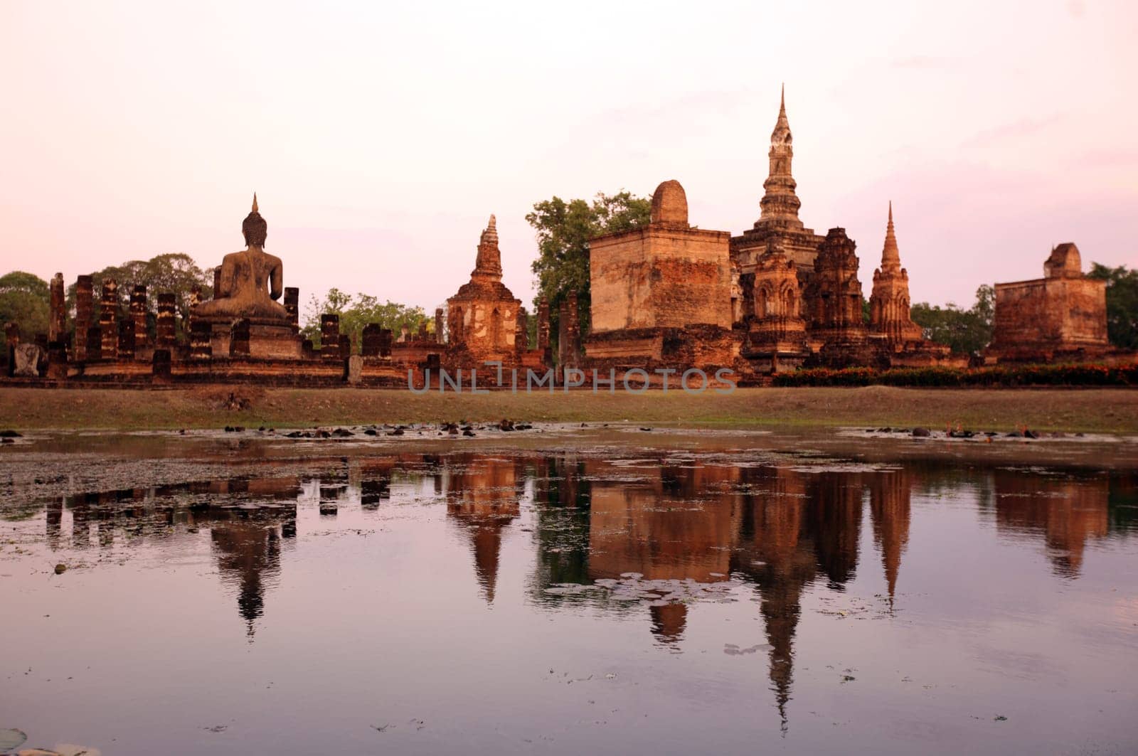 The Wat Mahathat Temple in the temple complex of Alt-Sukhothai in the province of Sukhothai in the north of Thailand in South East Asia.