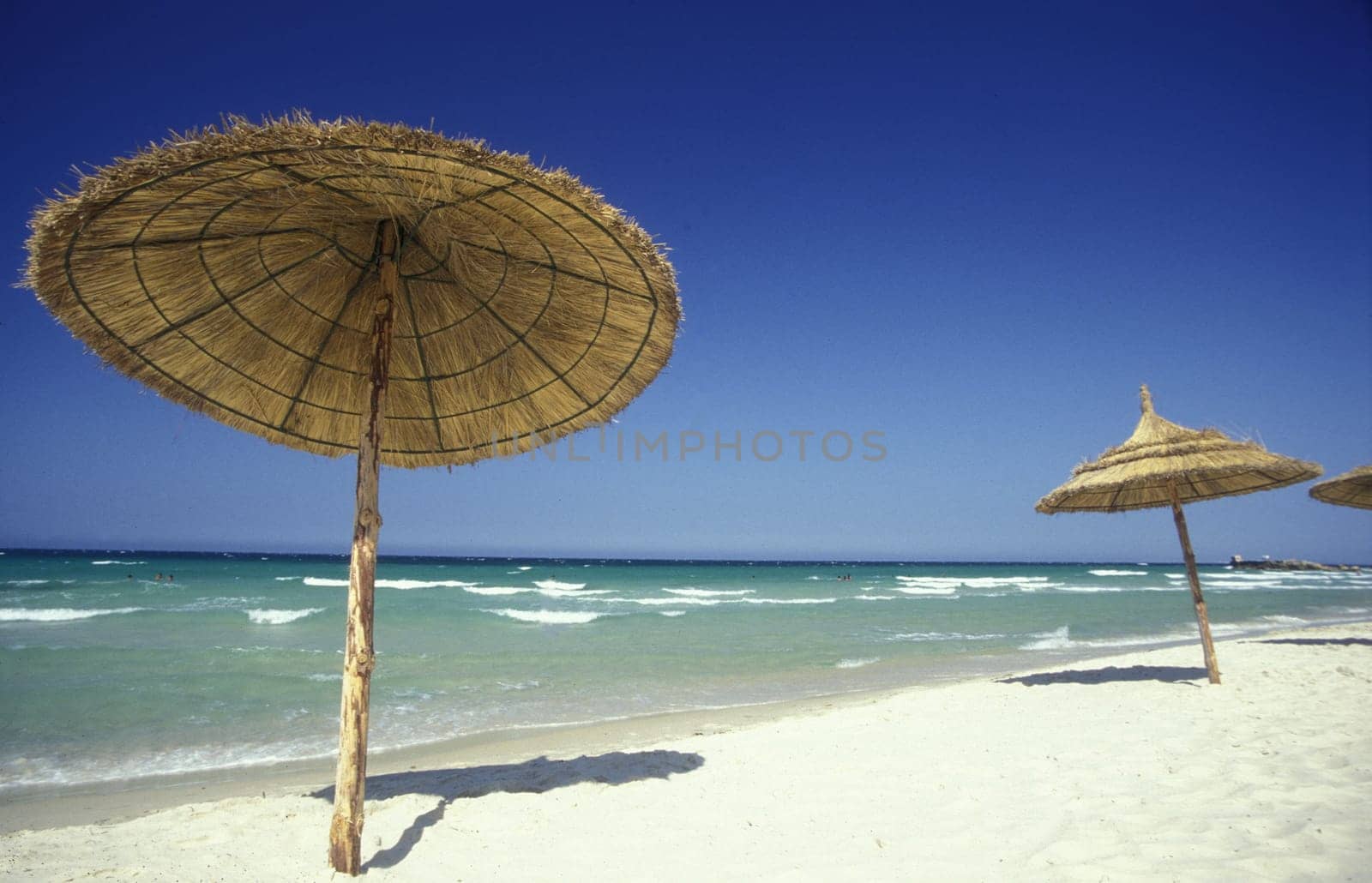 The beach on the Mediterranean Sea at the old town in Monastir on the Mediterranean Sea in the northeast of Tunisia in North Africa.