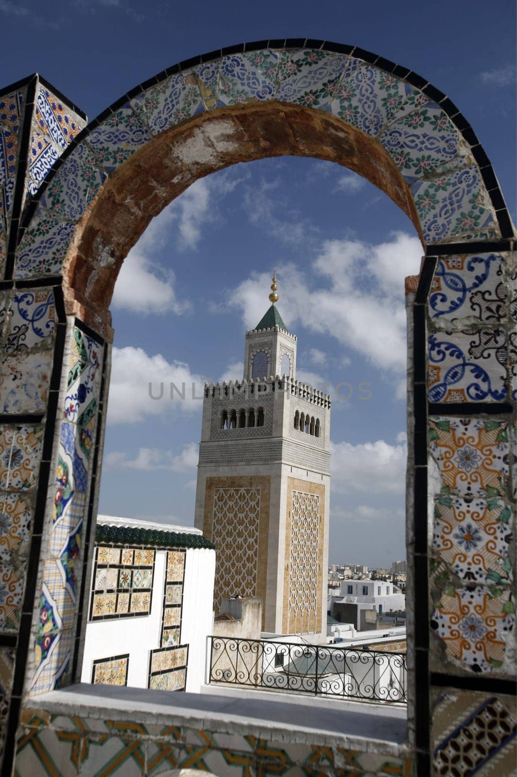 The minaret of the MosqueZaytouna or Grand Mosque in the Old Town or Medina of the capital Tunis in the north of Tunisia in North Africa on the Mediterranean Sea.
