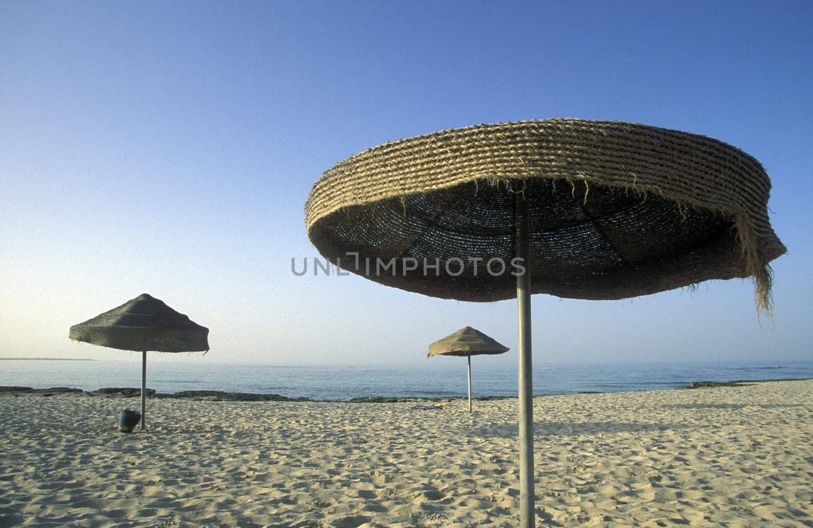 A sandy beach on the island of Jierba in the south of Tunisia in North Africa.