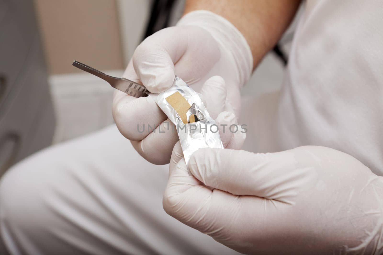 Scalpel blade in the packaging
