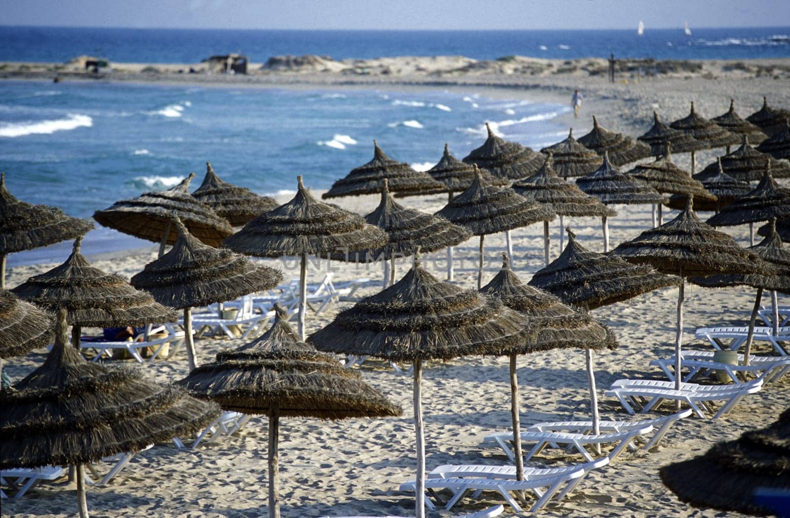 The beach on the Mediterranean Sea at the old town in Monastir on the Mediterranean Sea in the northeast of Tunisia in North Africa.