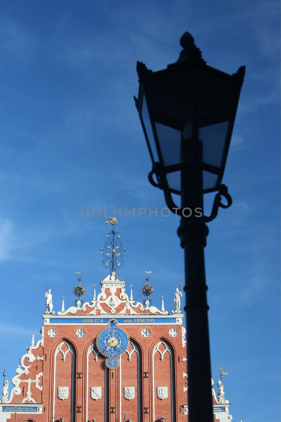 The St. Peter's Church and the Black House in the Old Town of Riga,the main city of Latvia in the BalticS in Eastern Europe.