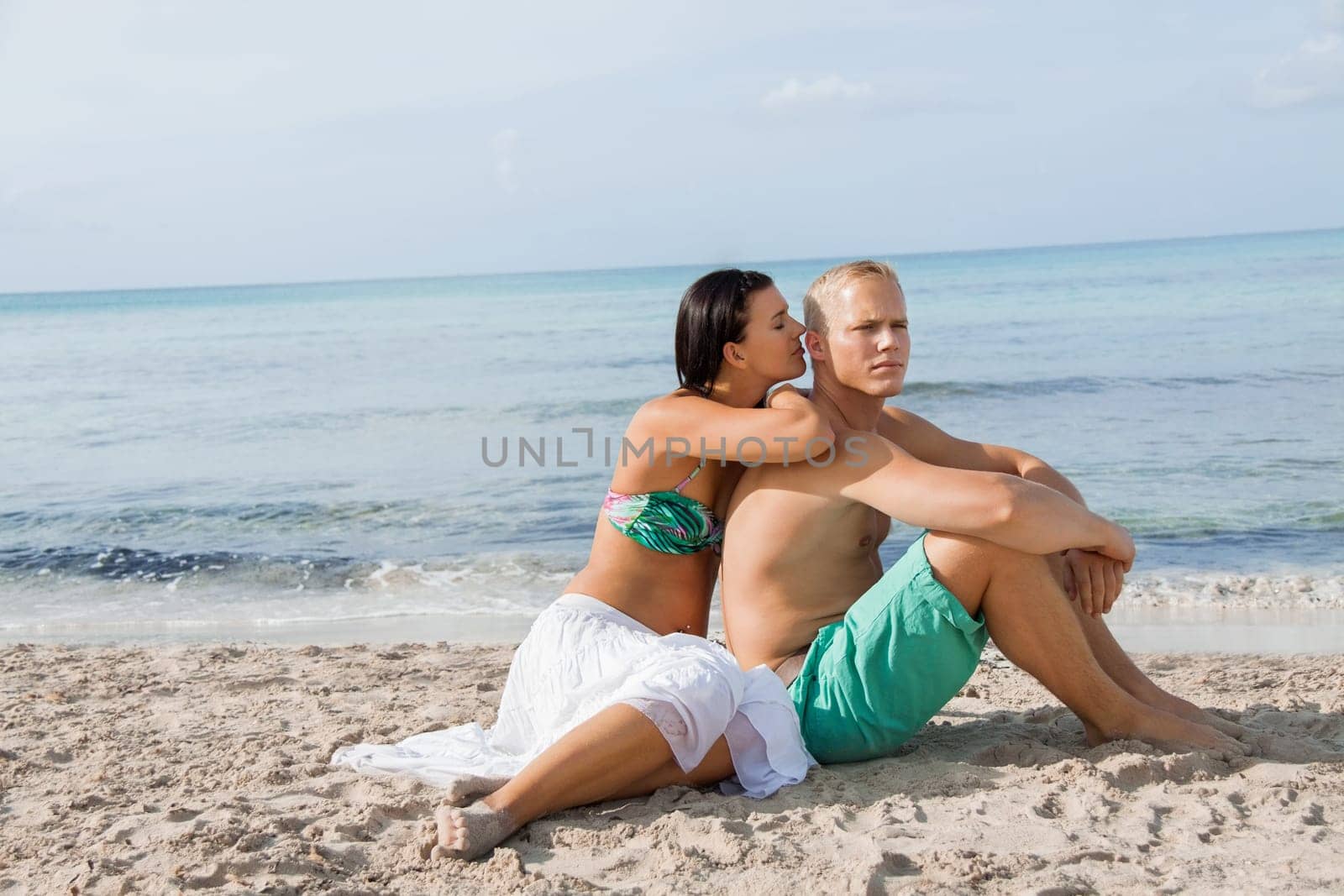 young happy couple in love on the beach in summer holidays rest rest holiday sun