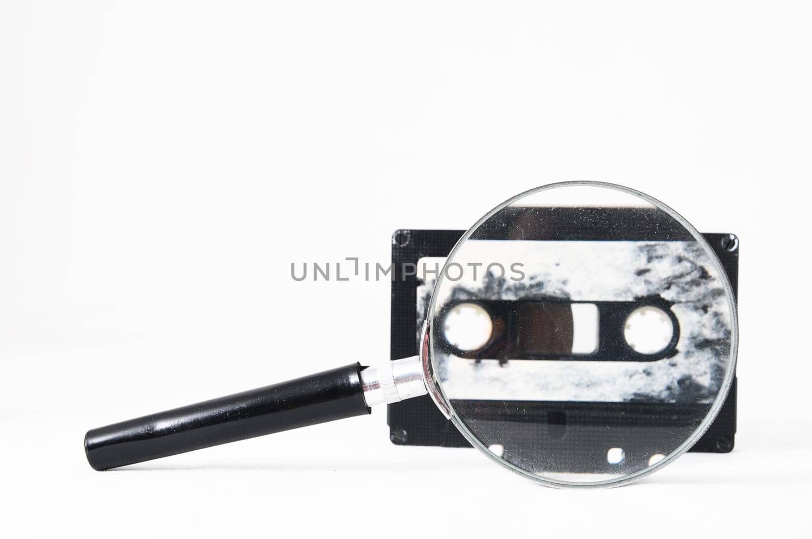 Ancient Vintage Used Musicassette over a White Background