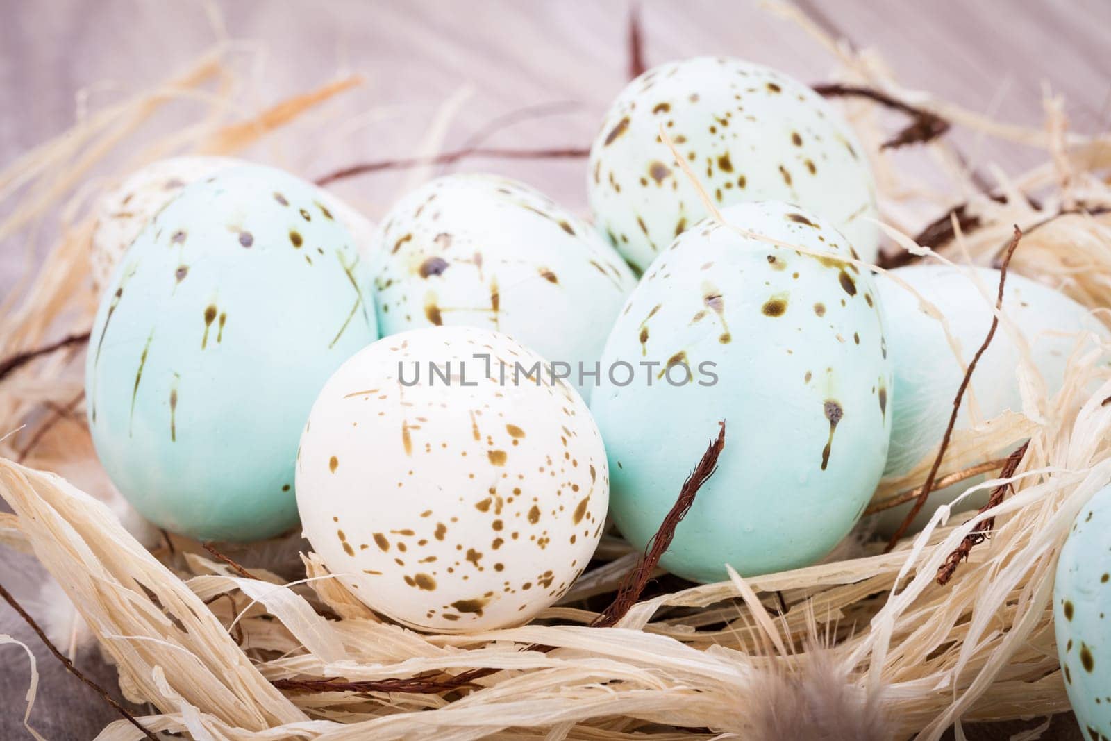colorful bright easter eggs in a basket on a wooden table Easter decoration need spring festive