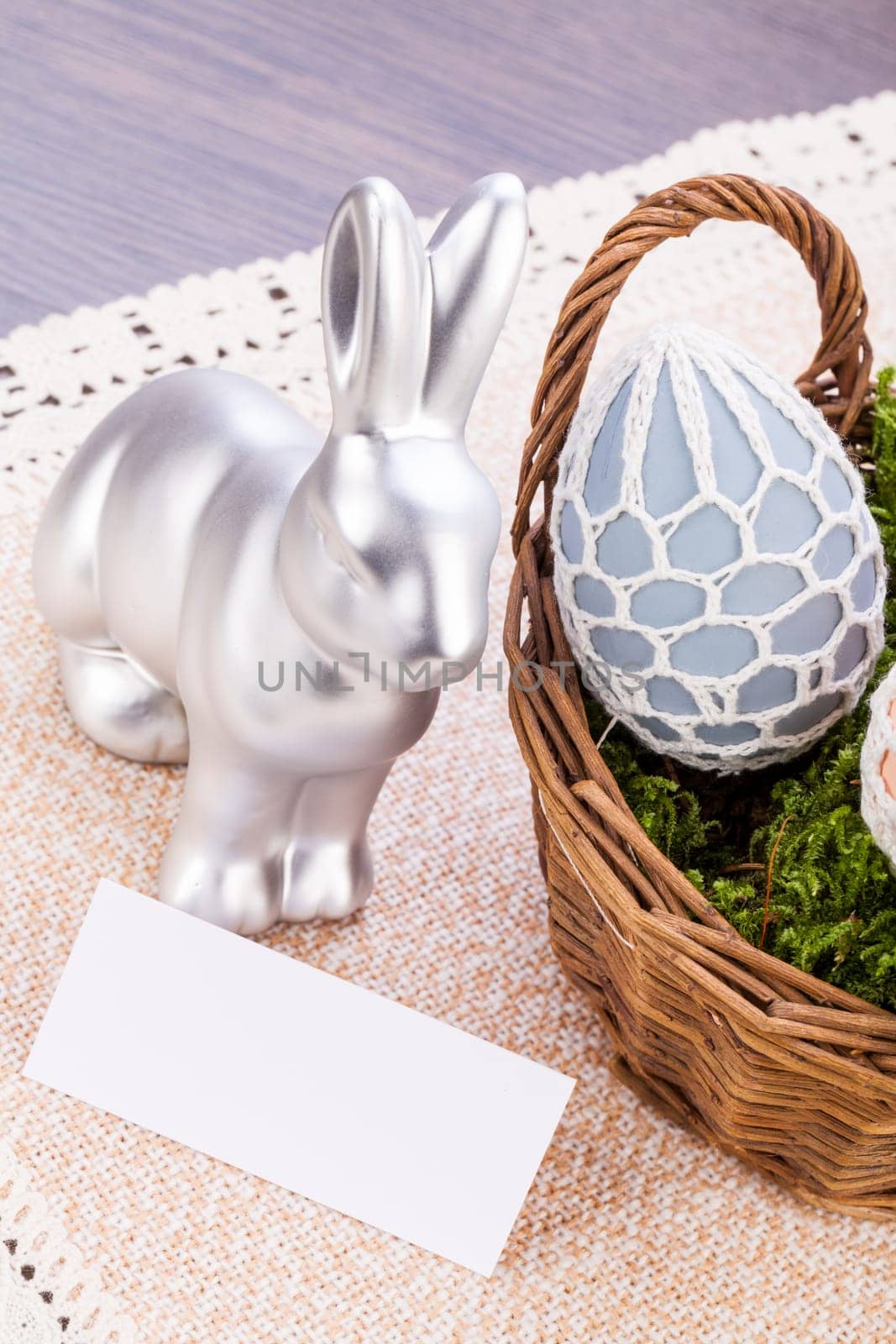 Colourful yellow and red Tulip with Easter eggs decorated at Easter with text space on green background