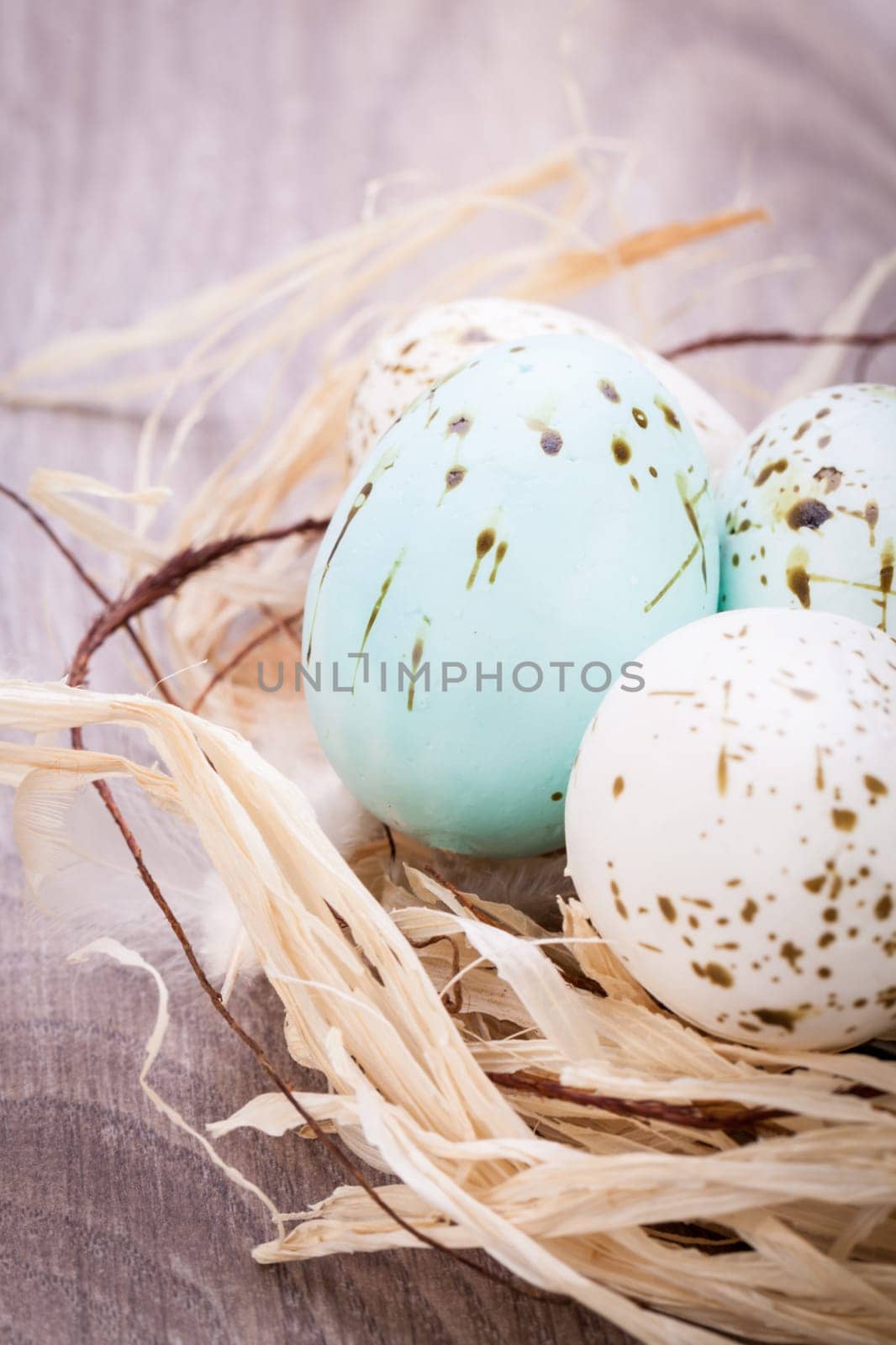 colorful bright easter eggs in a basket on a wooden table Easter decoration need spring festive