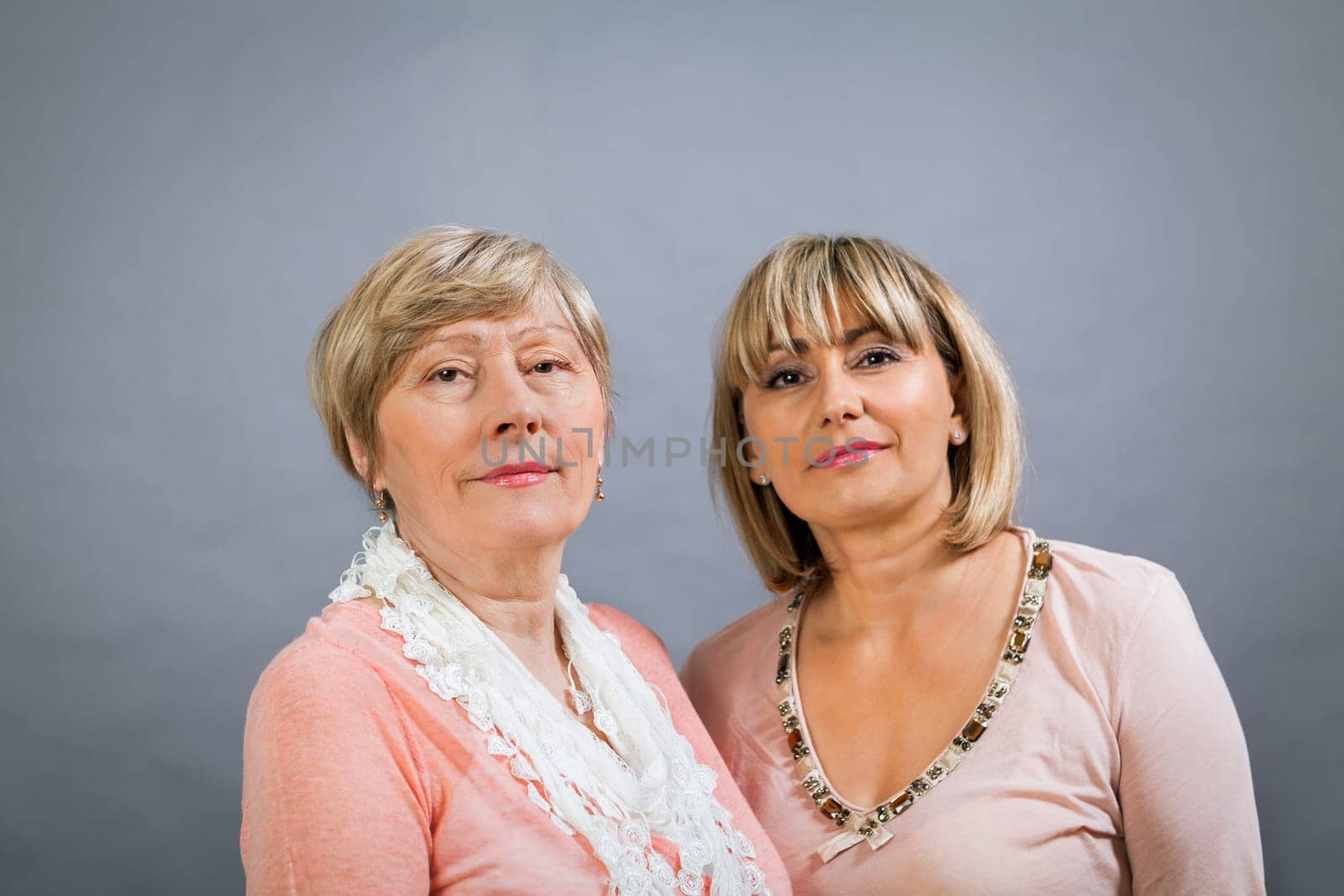 older adult happy wife mother with adult daughter portrait generation against grey background