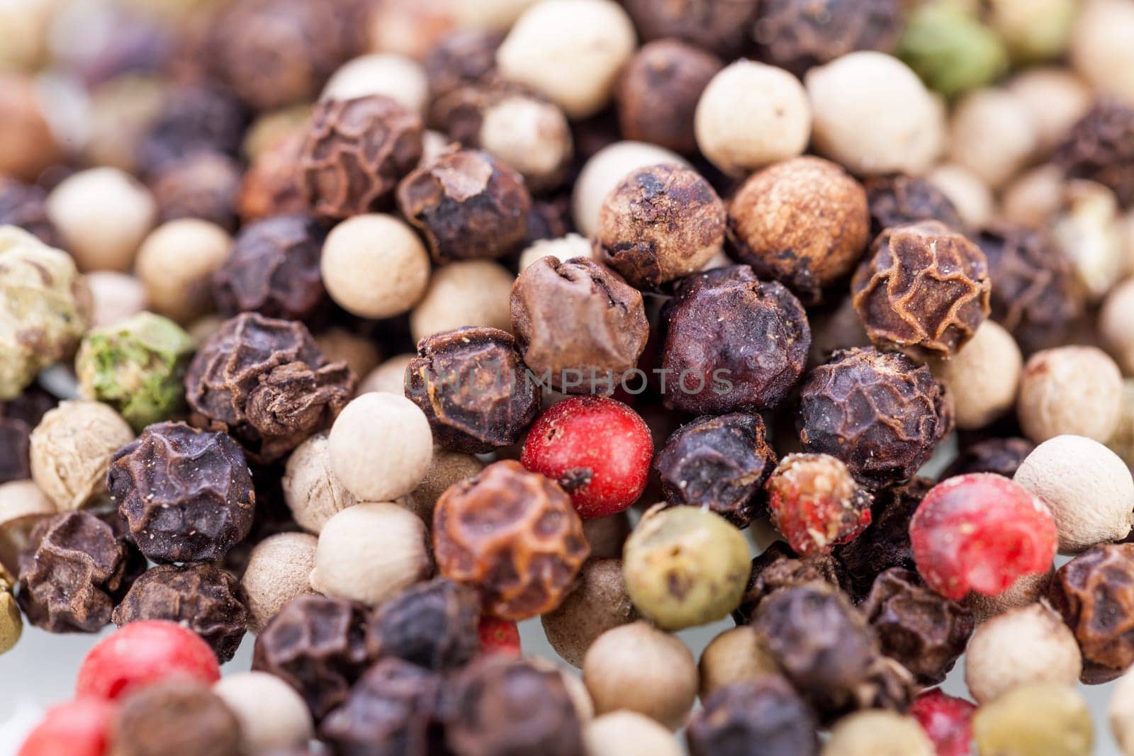 colorful dried peppercorns spice pepper close-up grains