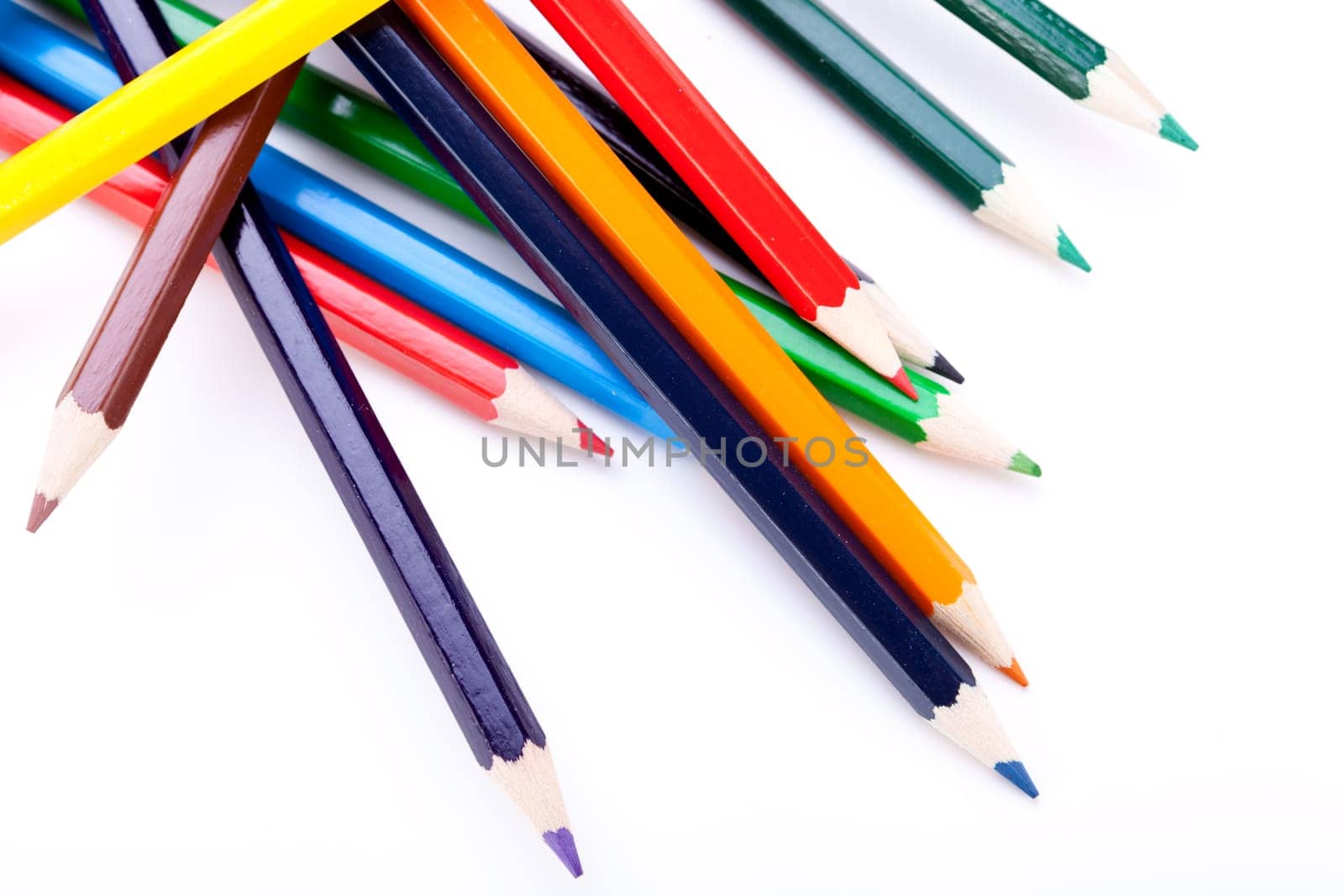 Colored pencils pencils in different colors resharpened insulated on white background
