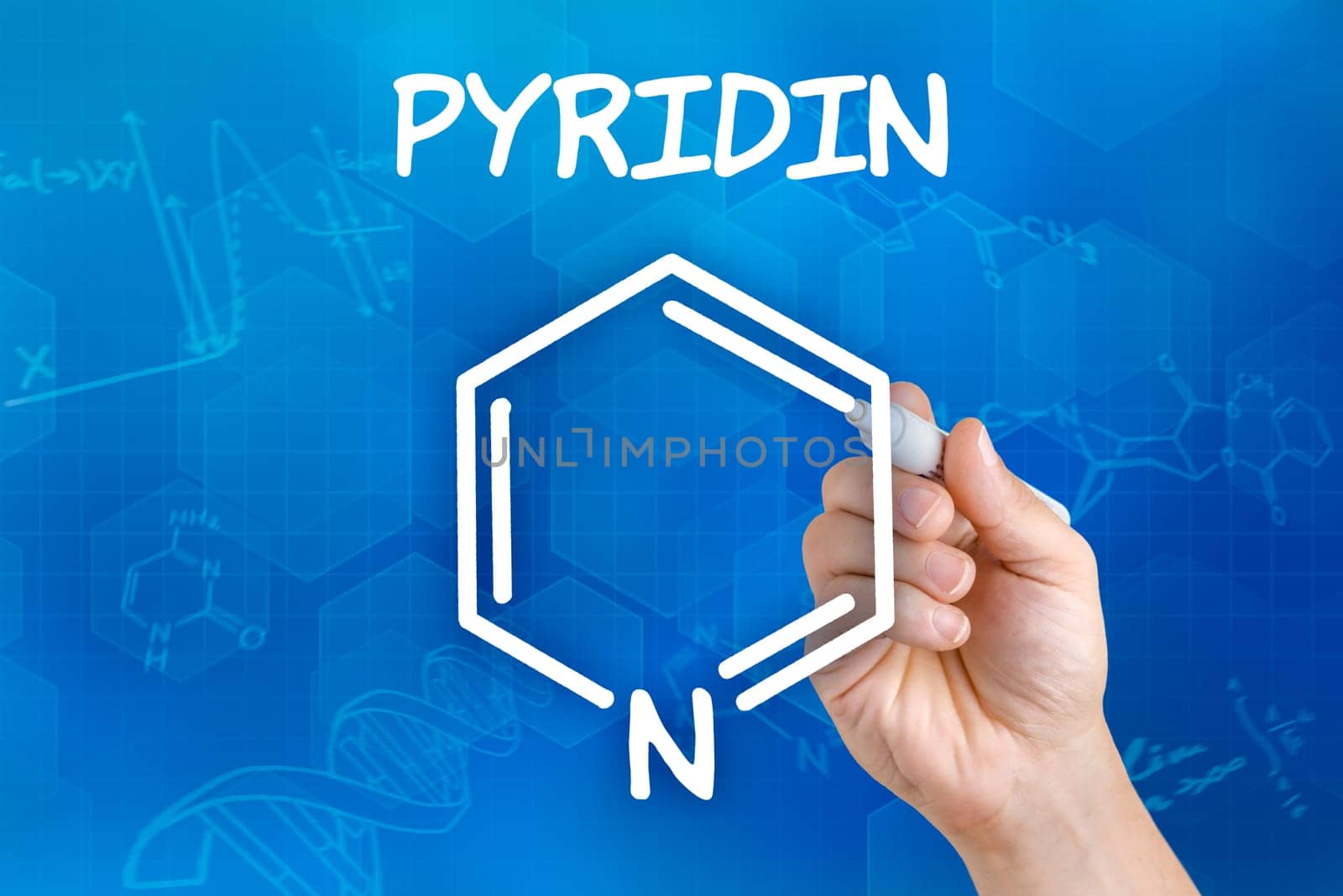 Hand draws chemical structural formula of pyridine