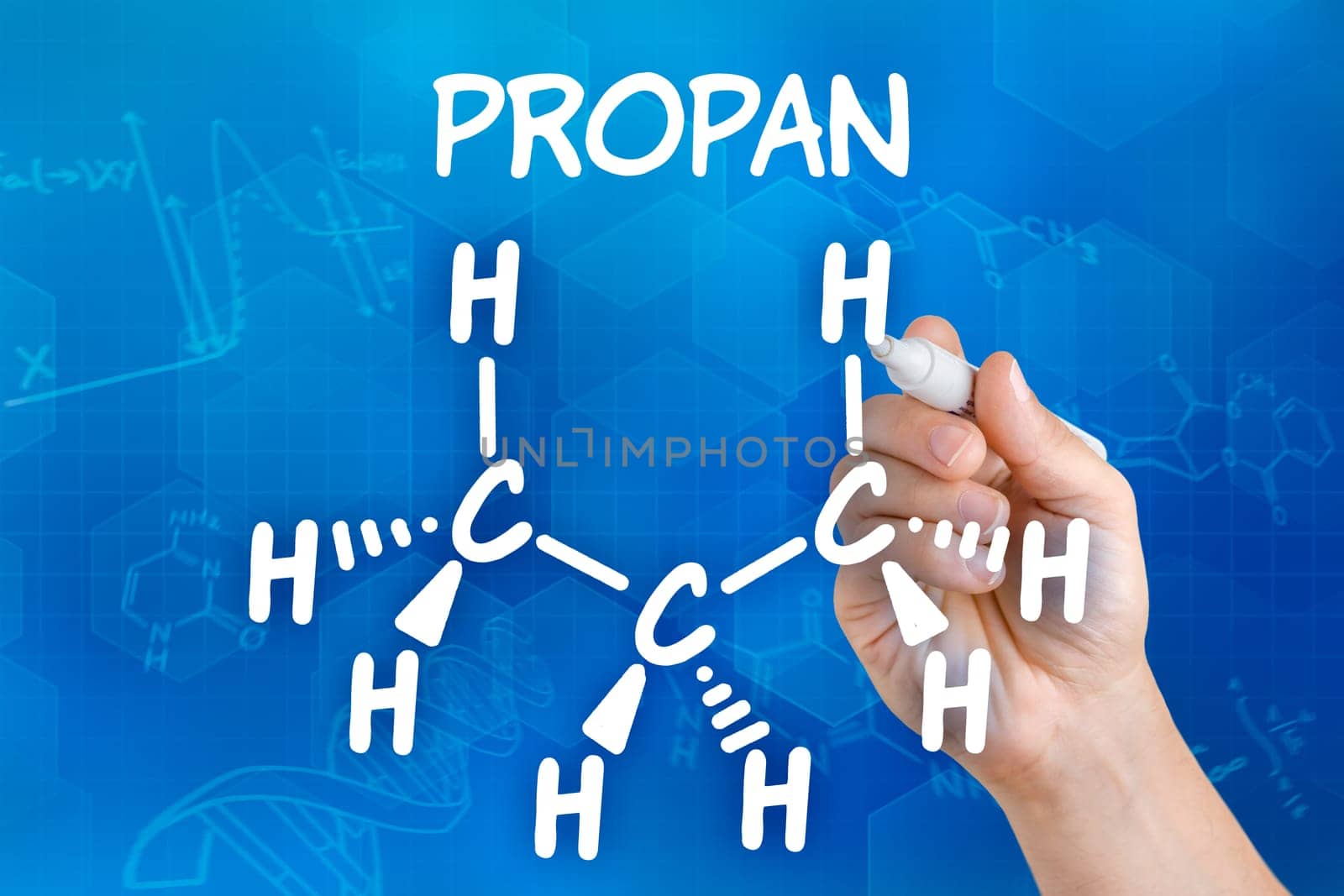 Hand draws chemical structural formula of propane