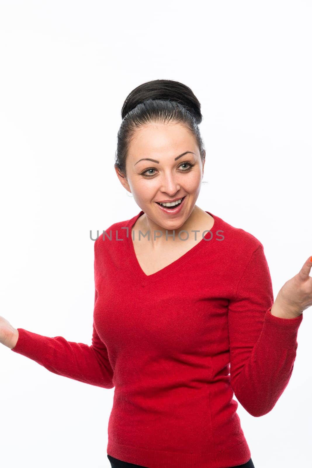 Portrait of beautiful caucasian woman wearing red dress and looking surprised