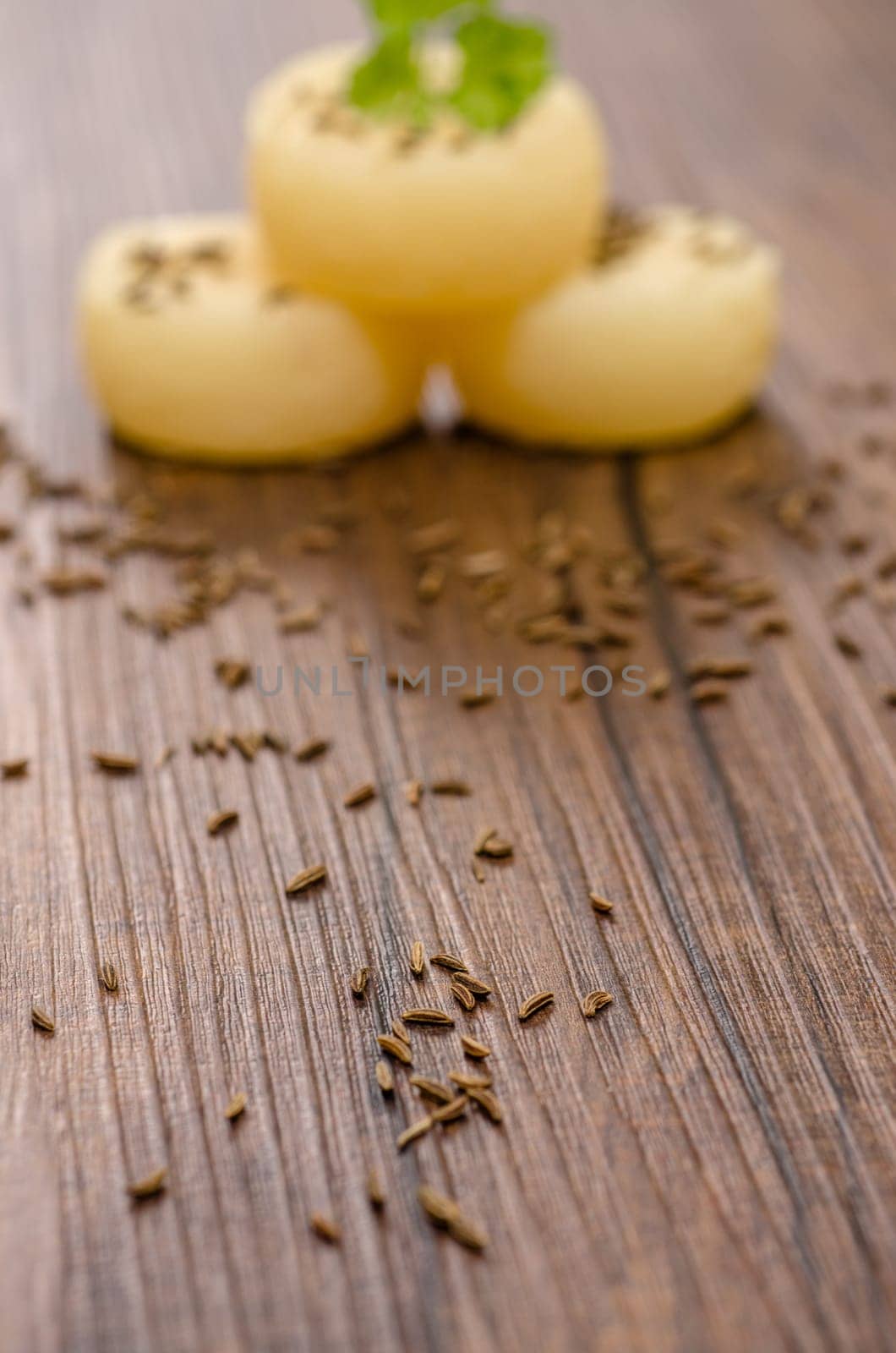 Caraway on wood with Harz cheese in the background