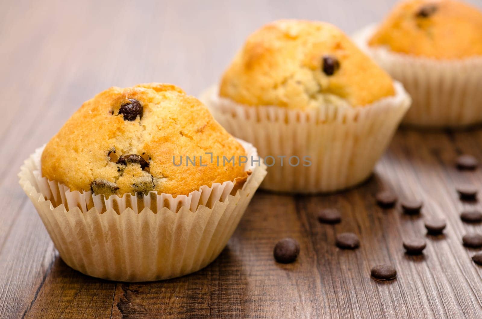 Close-up muffins with banana and chocolate