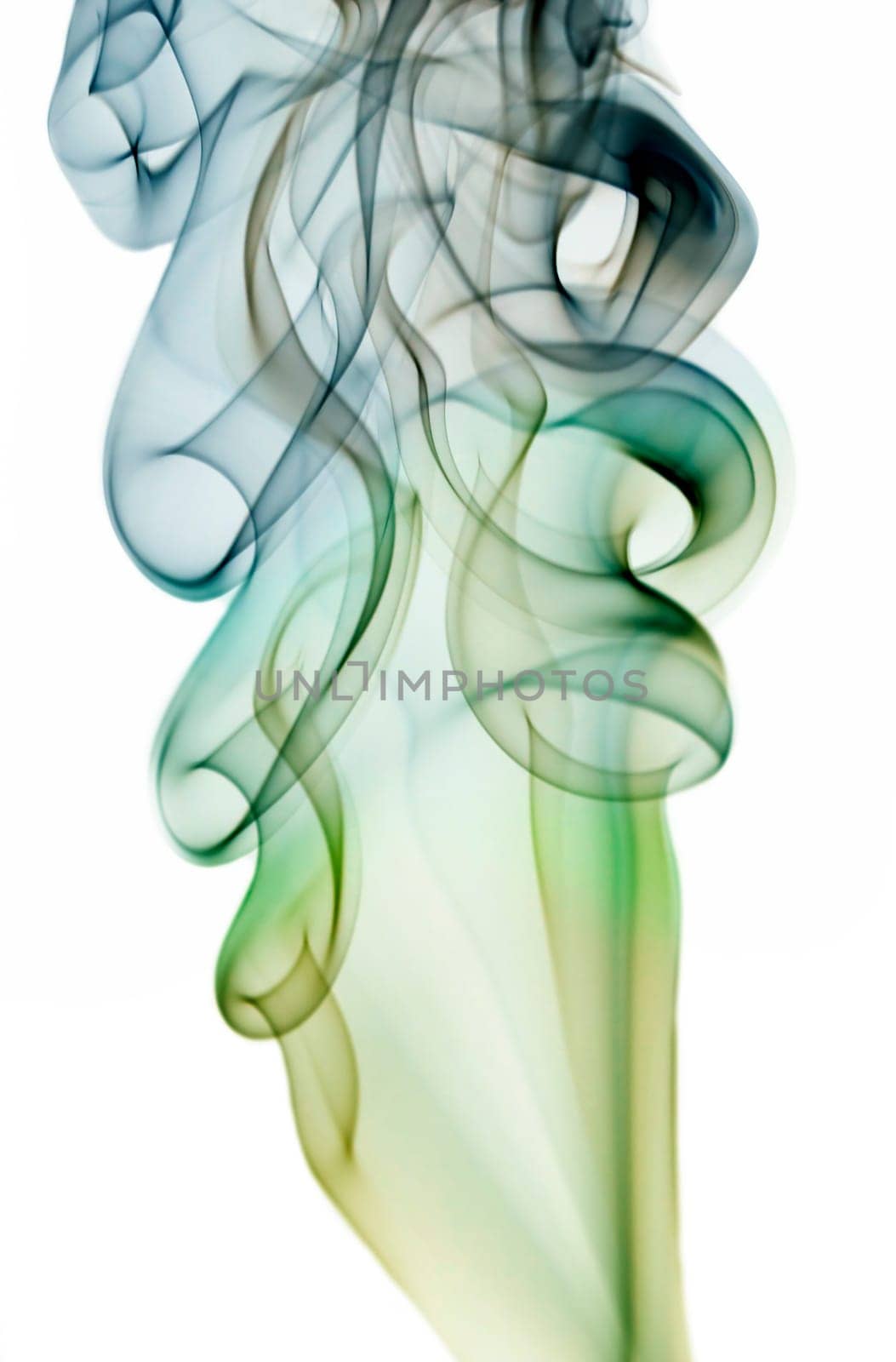 Close up on abstract colored smoke isolated on white background