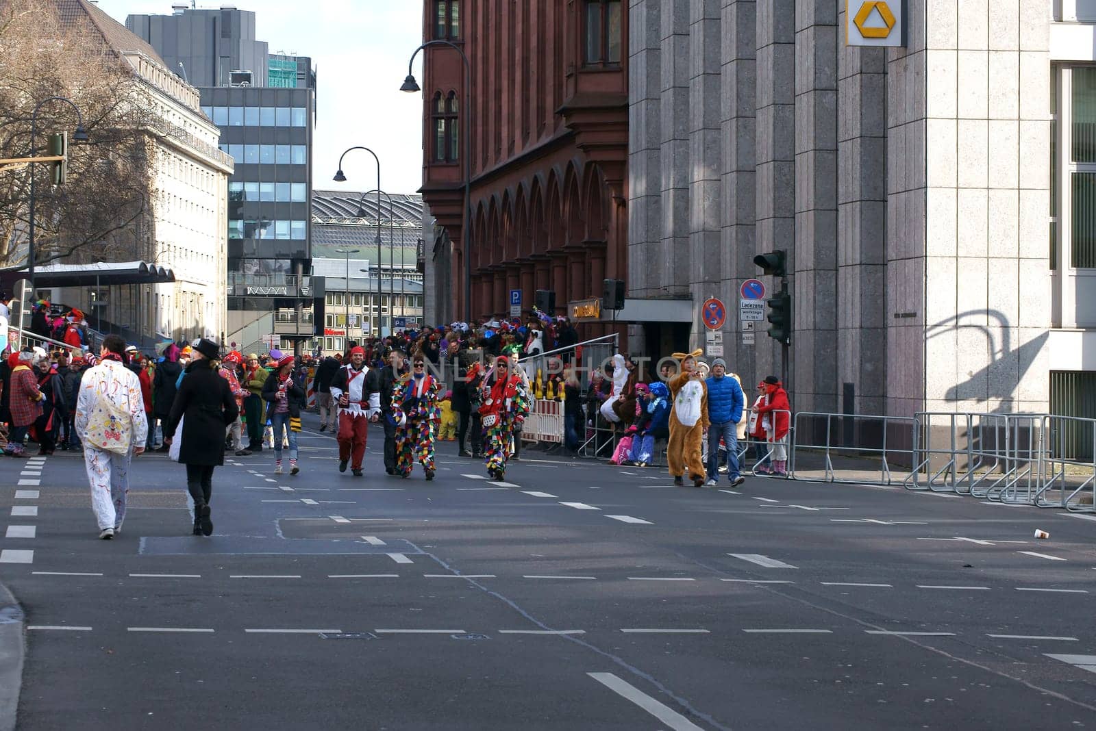 Cologne,Germany – March 02,2014: Colourfully dressed people wearing masks and costumes on the carnival procession on March 2,2014 in Cologne.