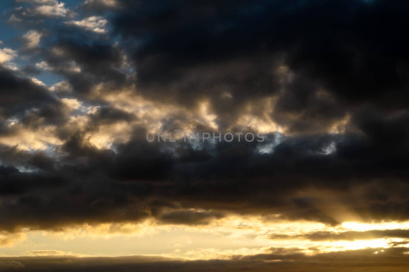 Cloudscape, Colored Clouds at Sunset near the Ocean