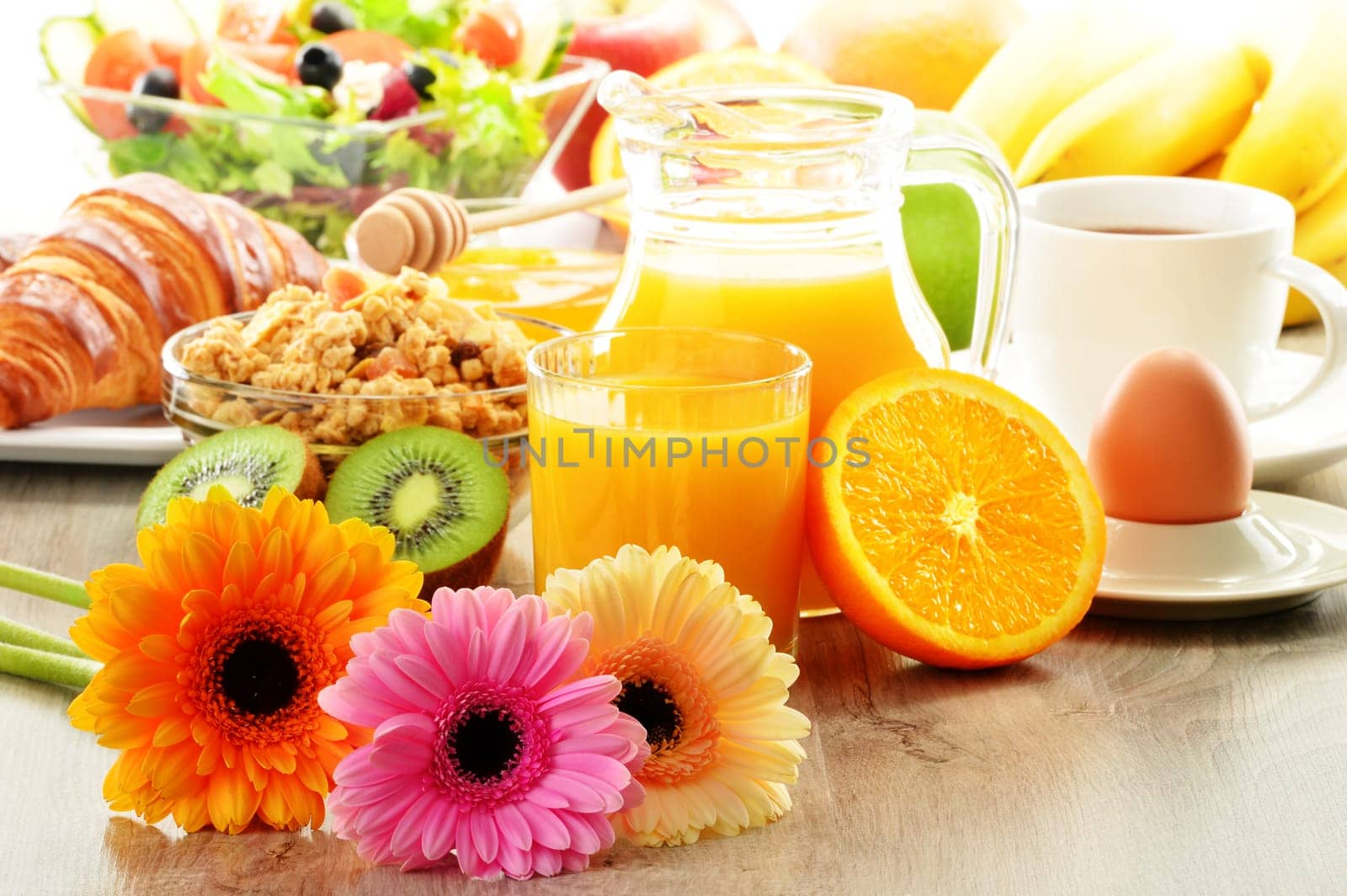 Breakfast with coffee, juice, croissant, salad, muesli and egg. Swedish buffet