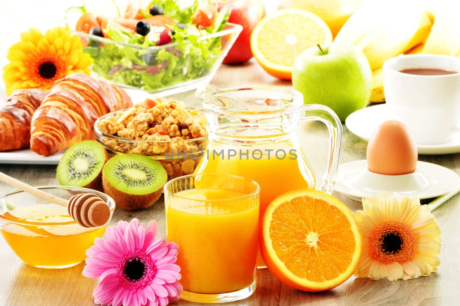 Breakfast with coffee, juice, croissant, salad, muesli and egg. Swedish buffet