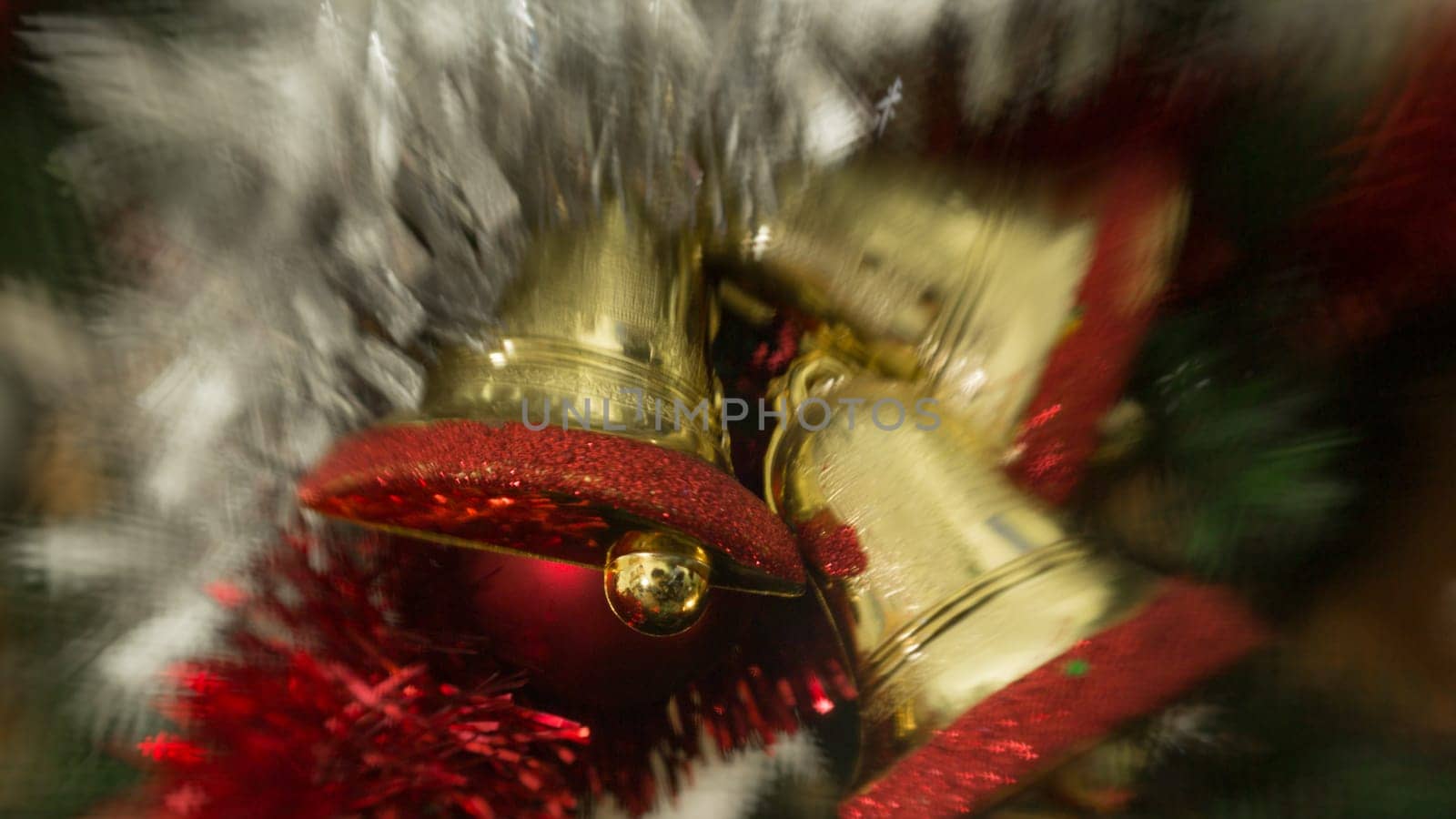 A closeup shot of a christmas tree decoration with different kind of ornaments