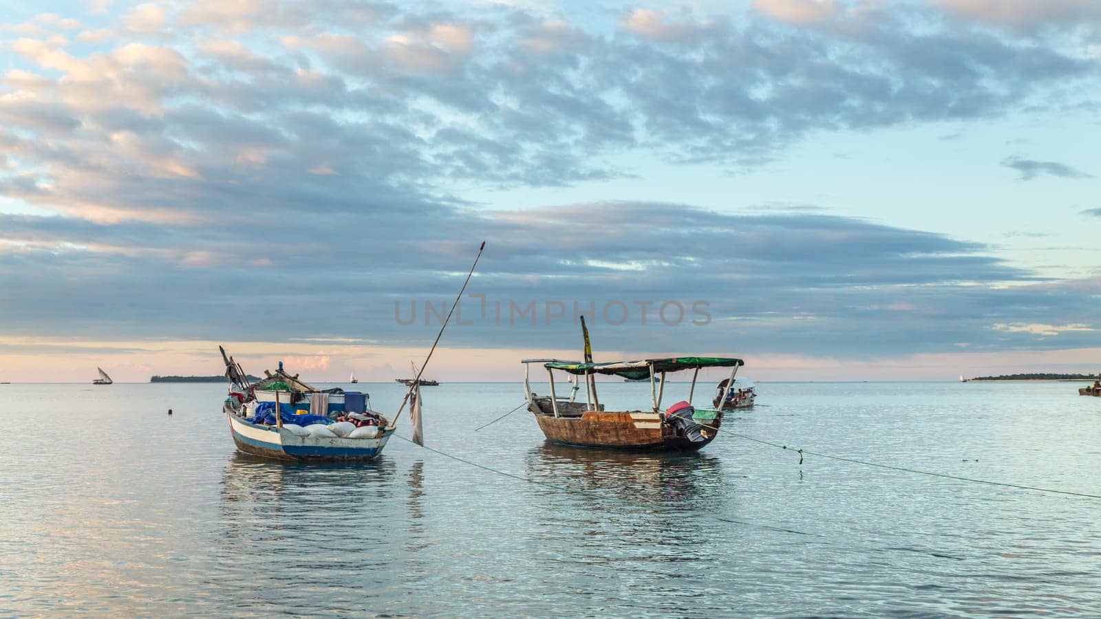 An old wooden boat anchored near the shores of Zanzibar in Tanzania