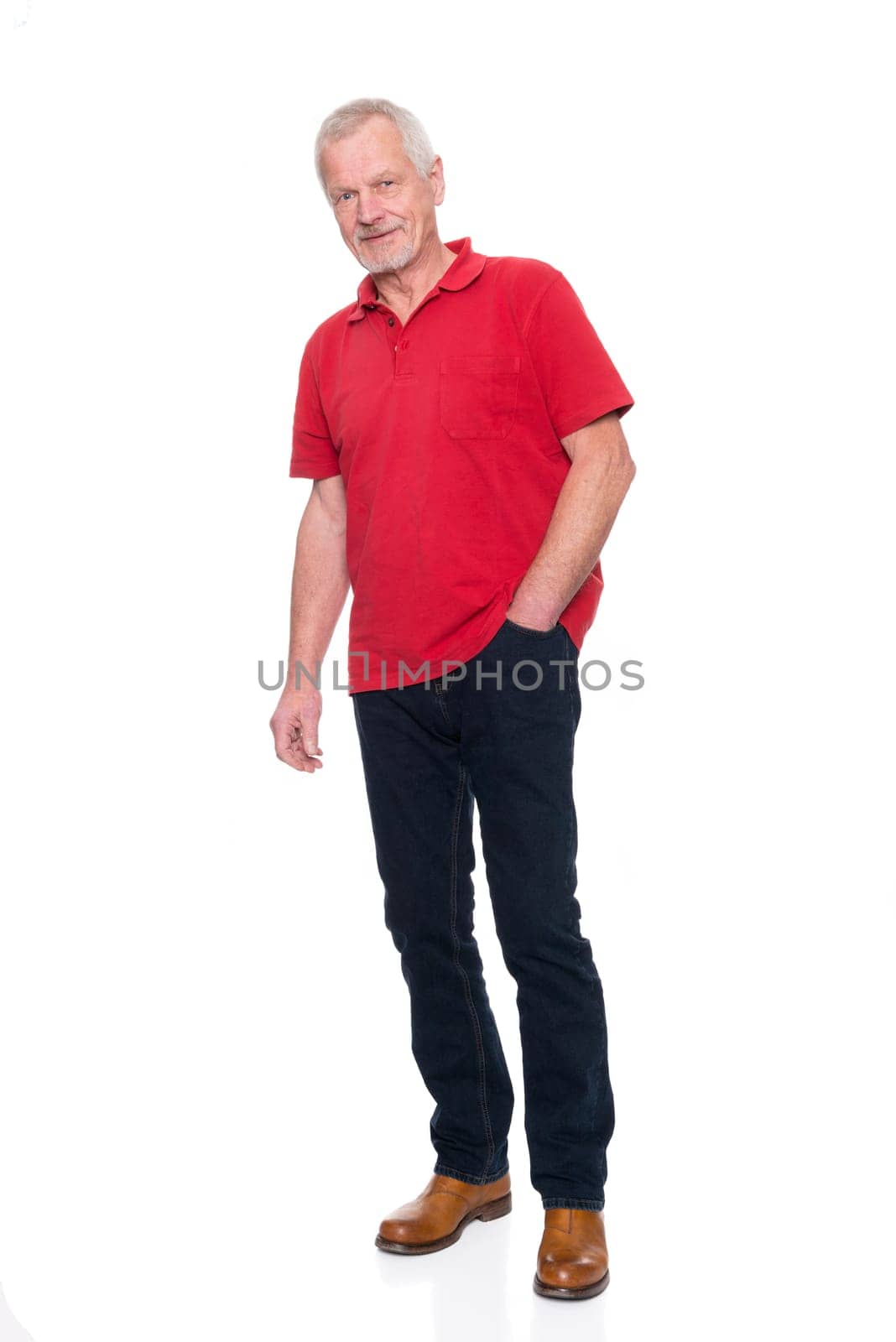 Studio recording of an active senior against a white background