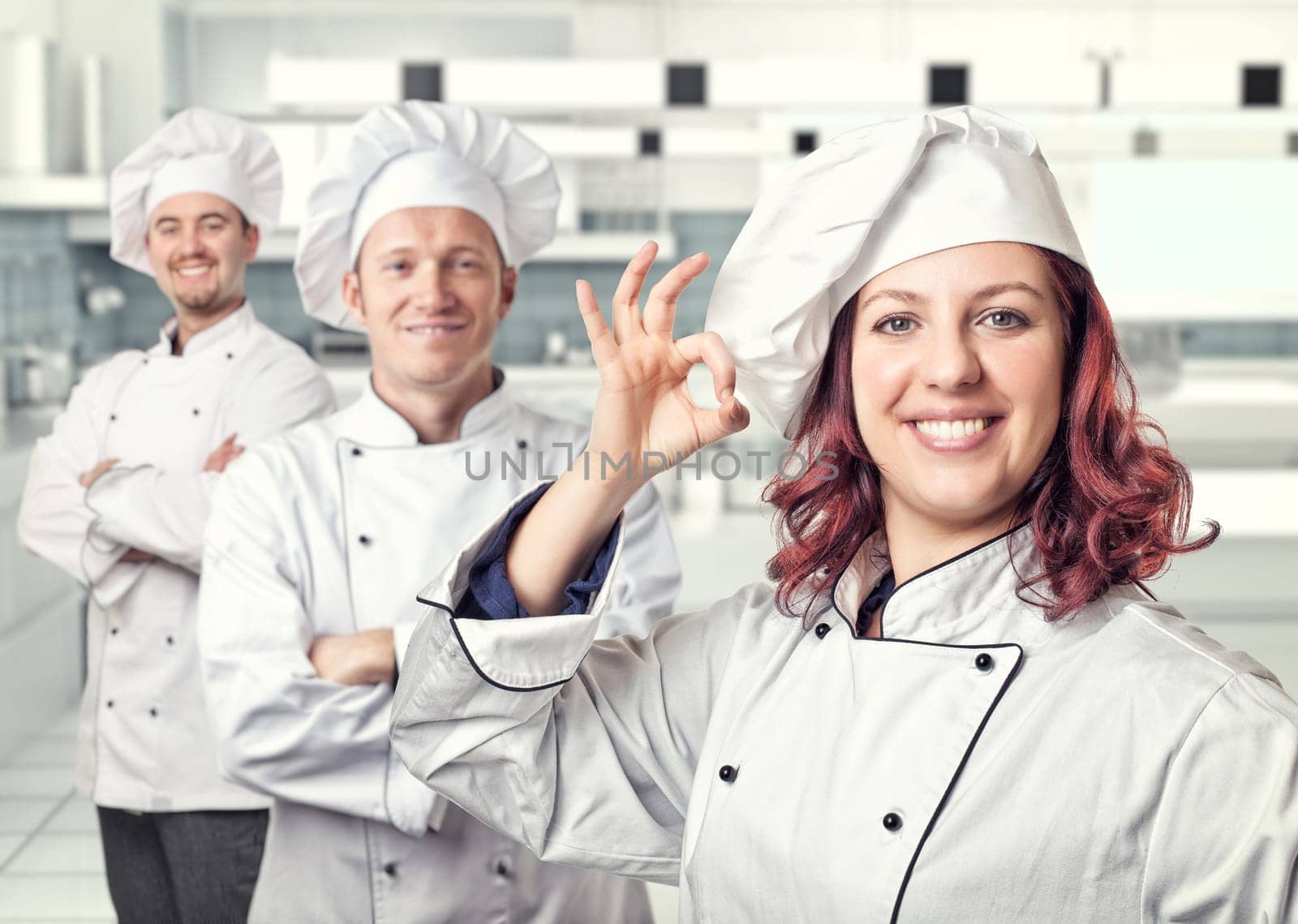 smiling young woman chef portrait