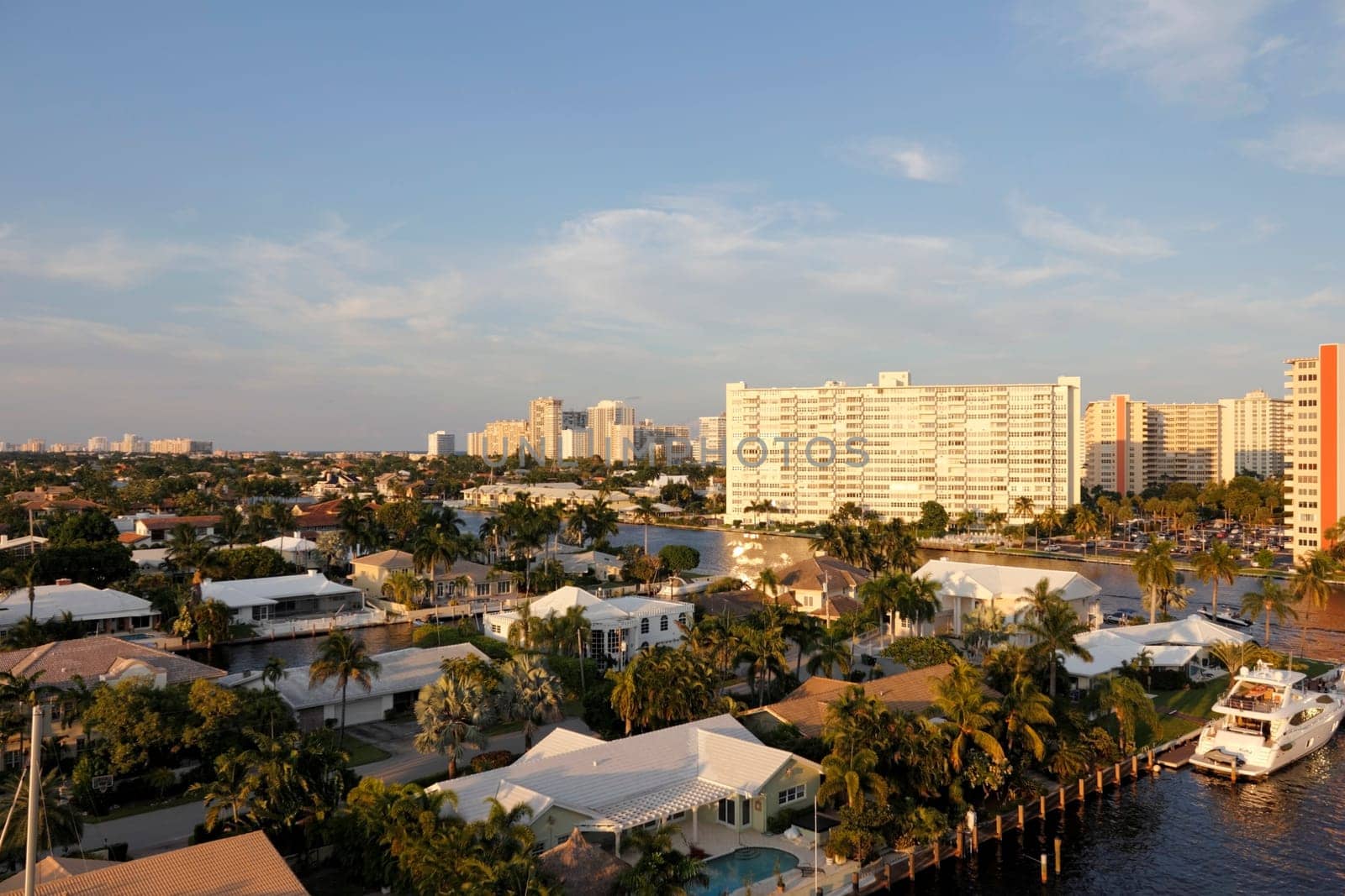 FORT LAUDERDALE, FLORIDA - OCTOBER 6, 2013: Overlooking the Intracoastal waterway and tropical Atlantic coast a glowing sky shines its beautiful evening tranquility on this tropical coastal city.