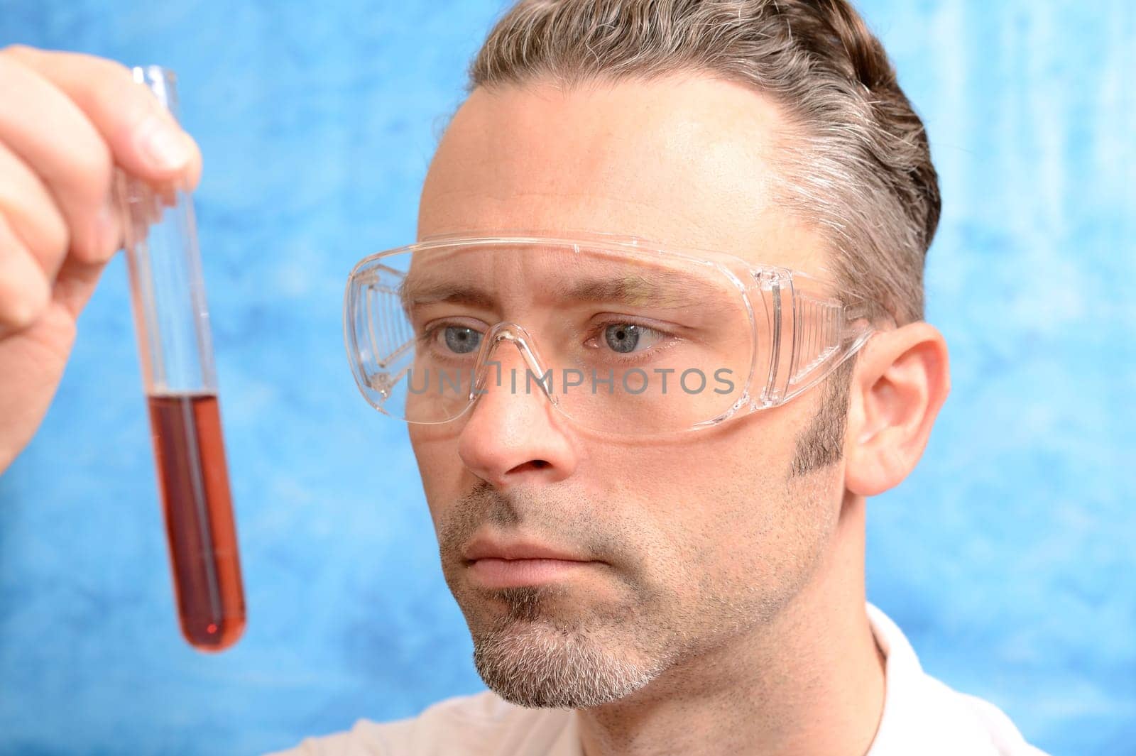 Pharmacist with test tube