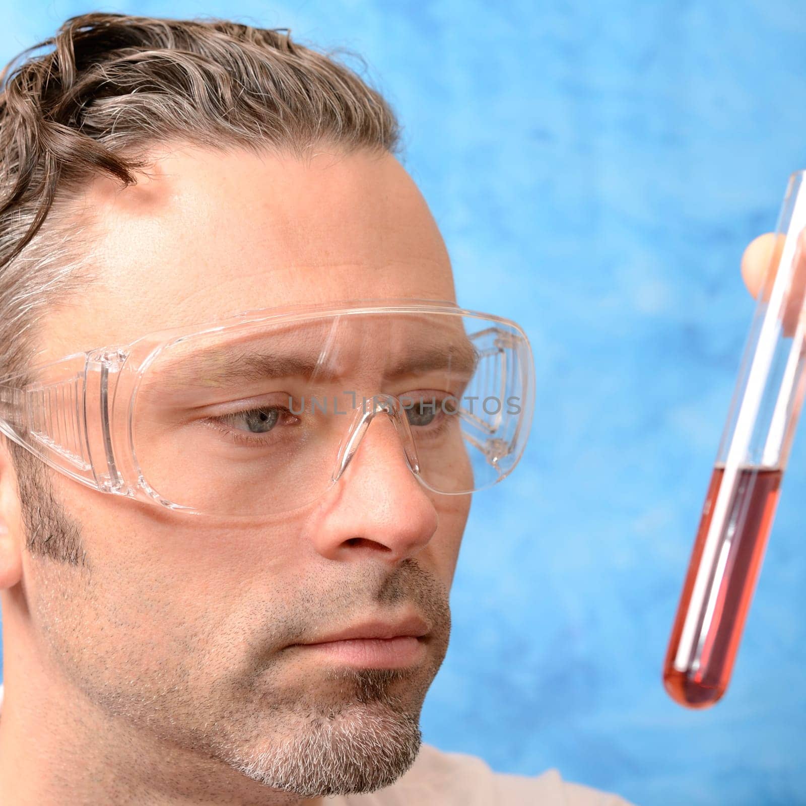 Pharmacist with test tube