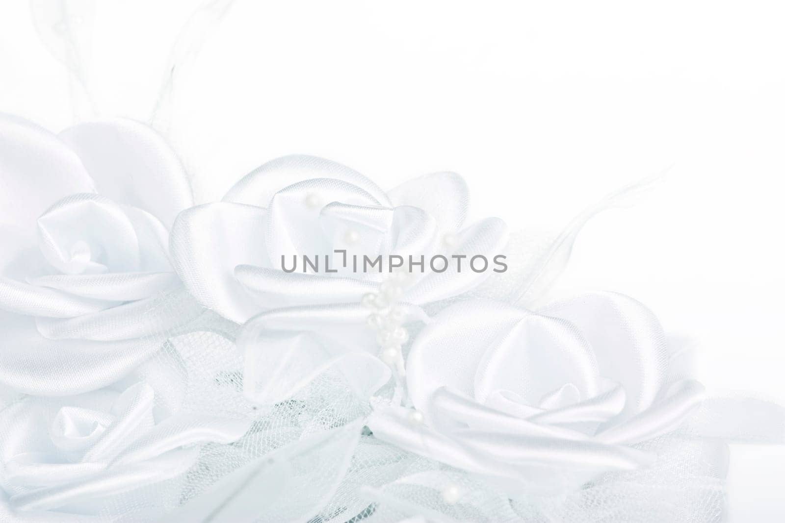 white textil roses from wedding decoration