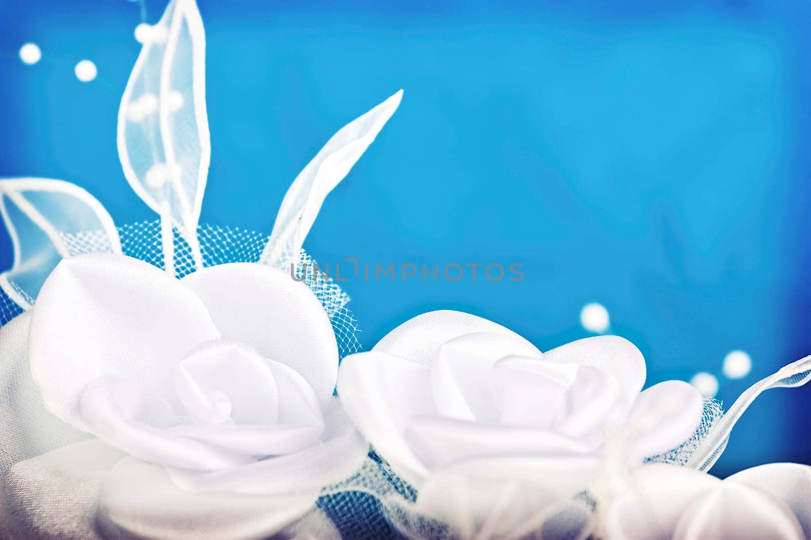 white textil roses from wedding decoration