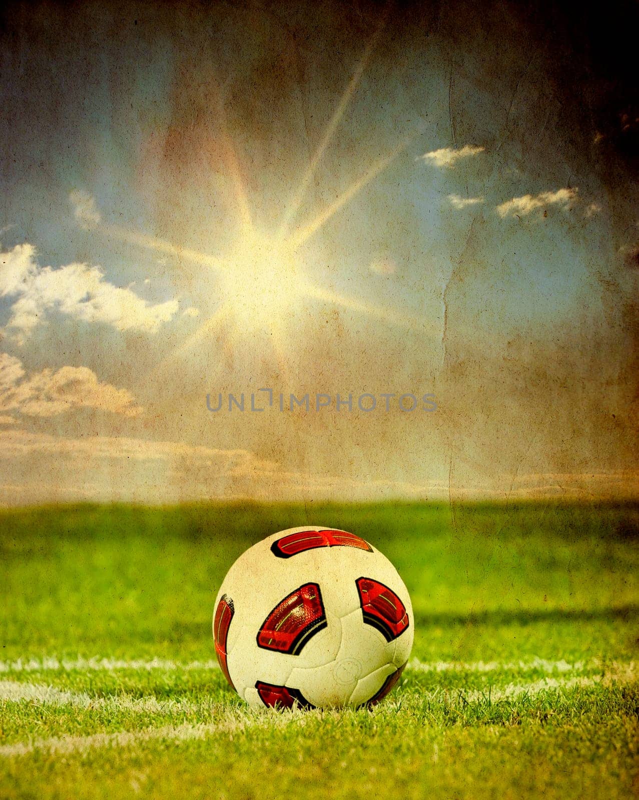 Soccer ball on green field