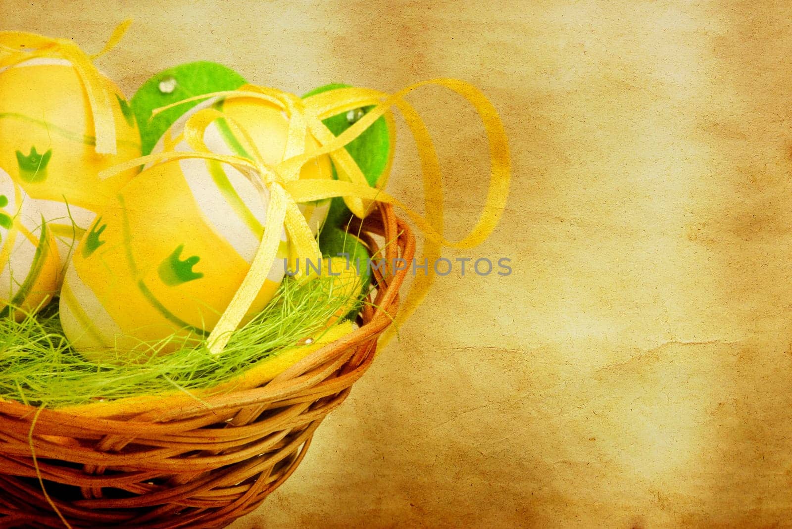 Vintage photo of a basket with easter eggs
