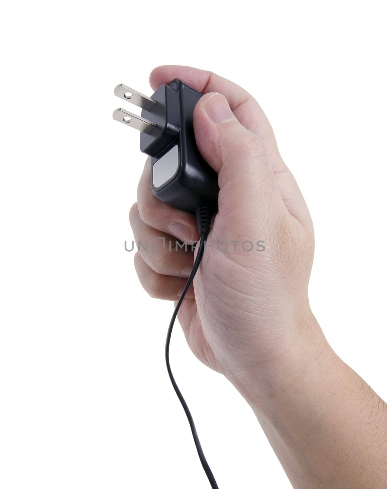 hand holding a power source ready to connect the outlet.
