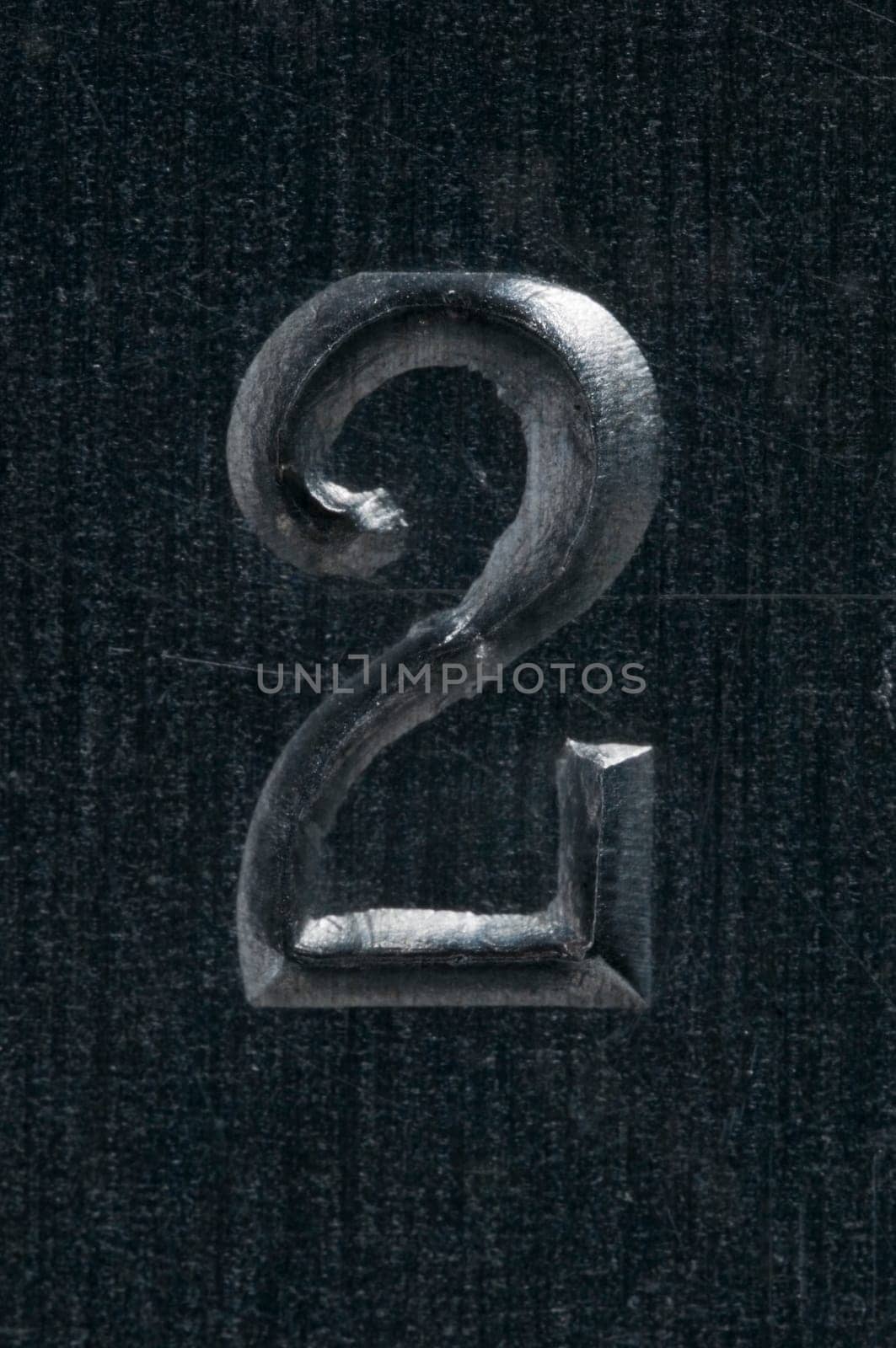 Macro image of a number in metal X
