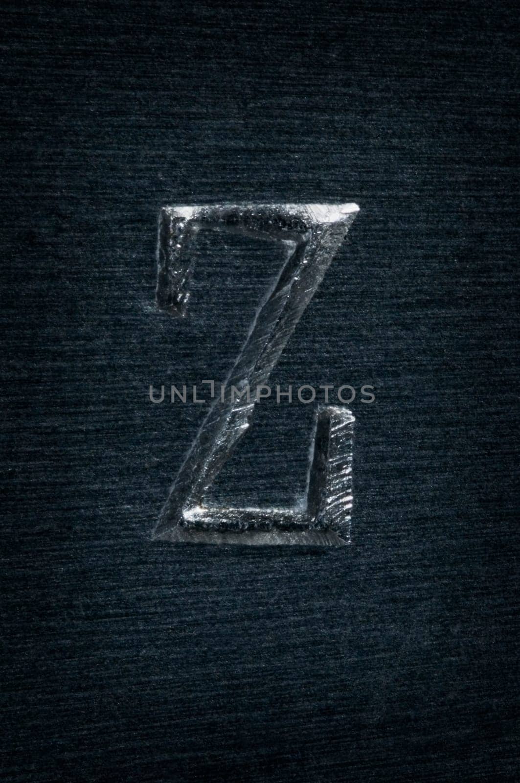 Macro image of the letter "Z"" in metal"