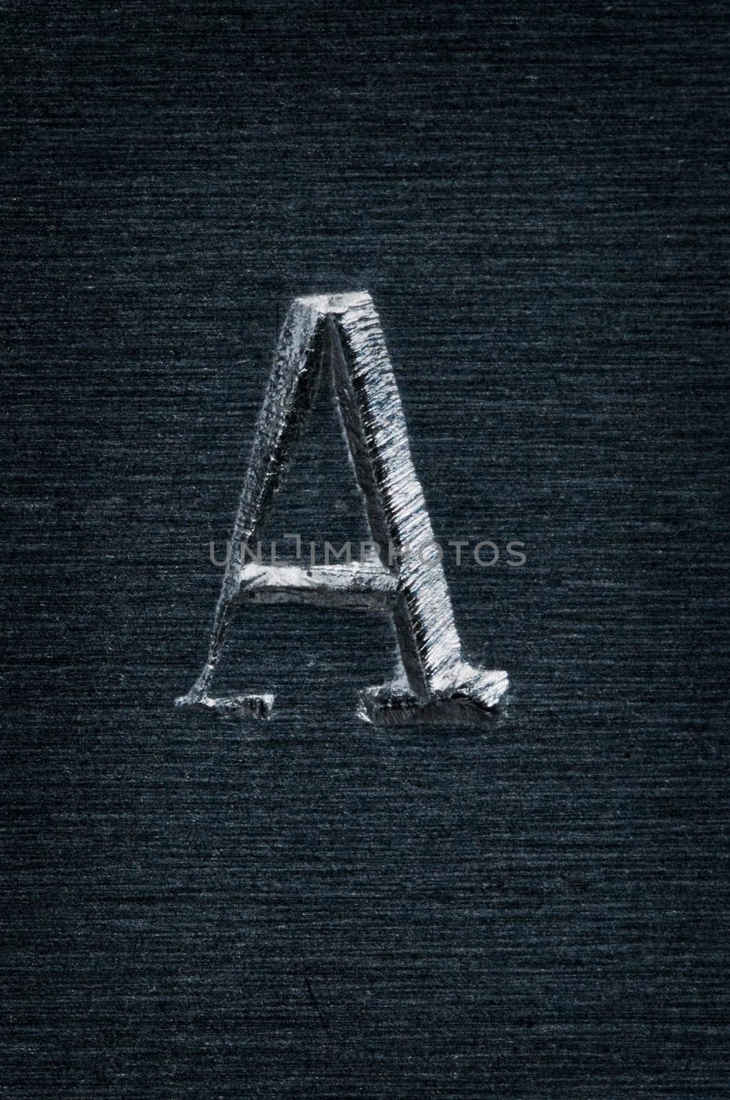 Macro image of the letter "A"" in metal"