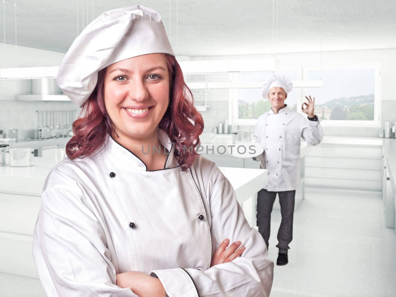 smiling young woman chef portrait and helper