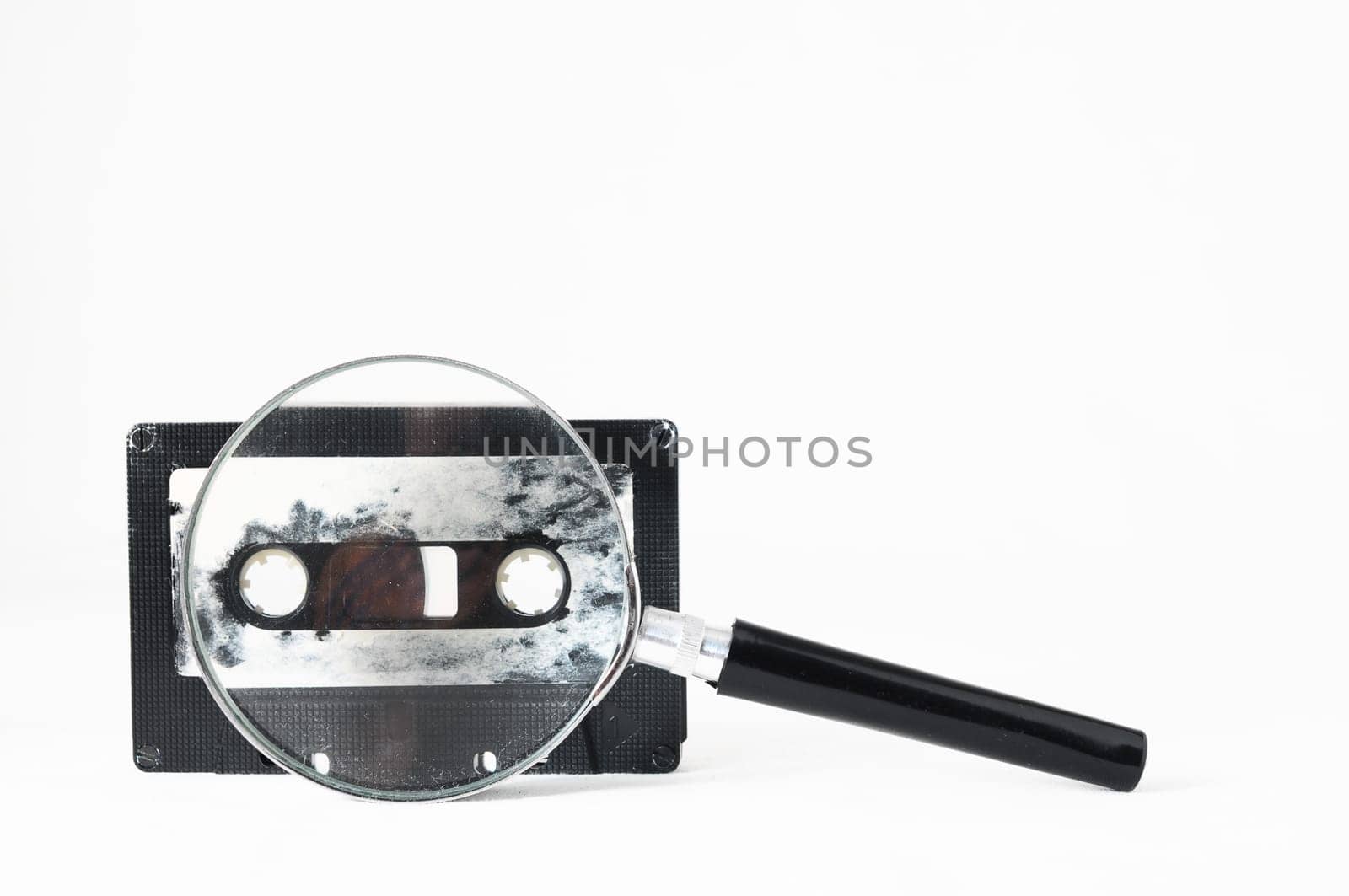 Ancient Vintage Used Musicassette over a White Background