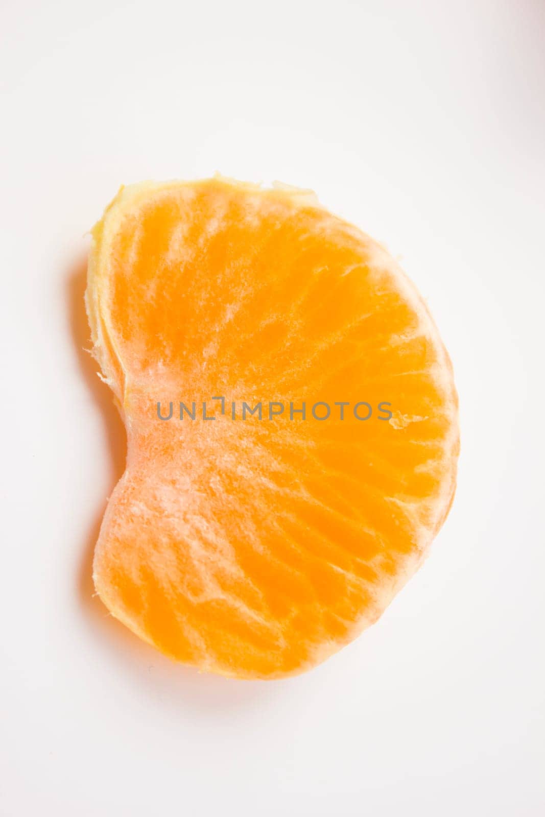 Vibrant mandarin fruit on a white background.