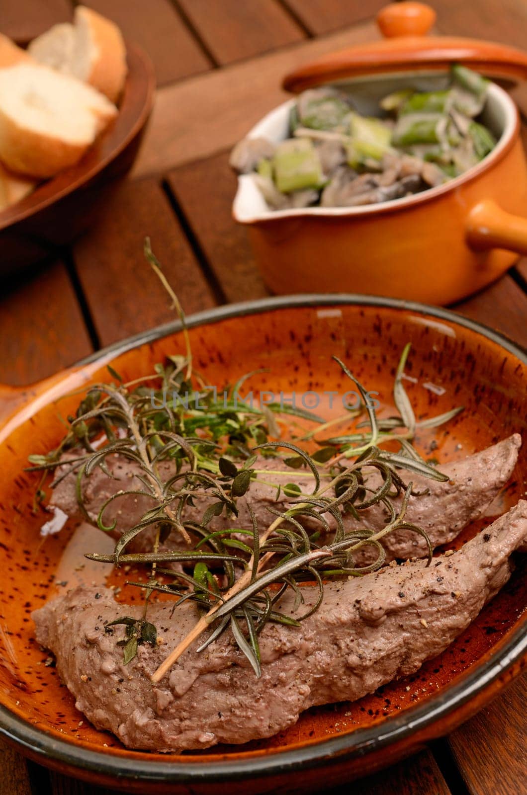 Filet of lamb with fried mushrooms and spring onions