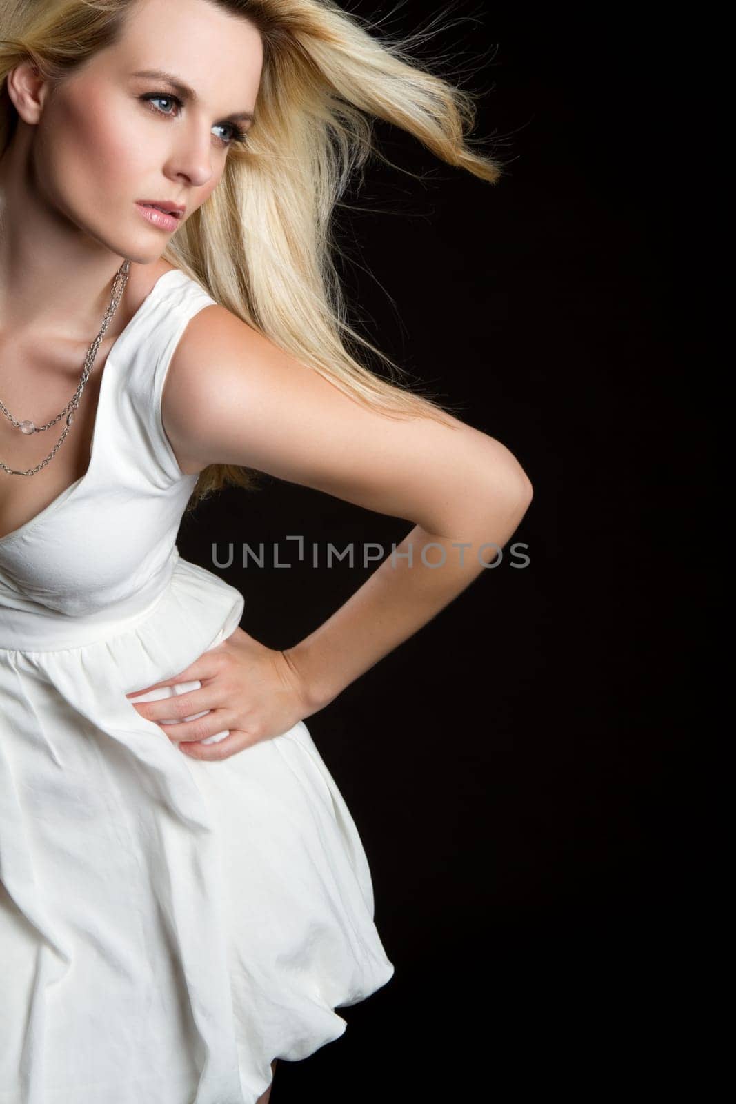 Beautiful young blond fashion woman
