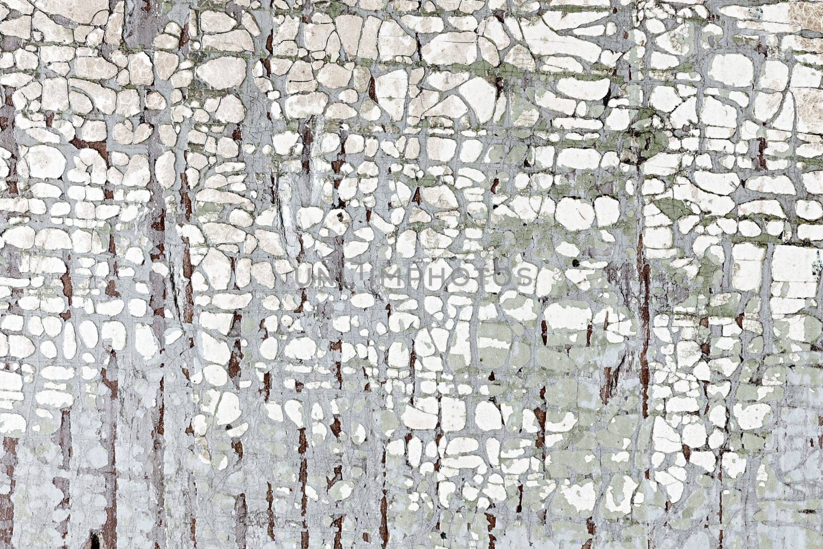 Old weathered chipped painted wood as grunge background